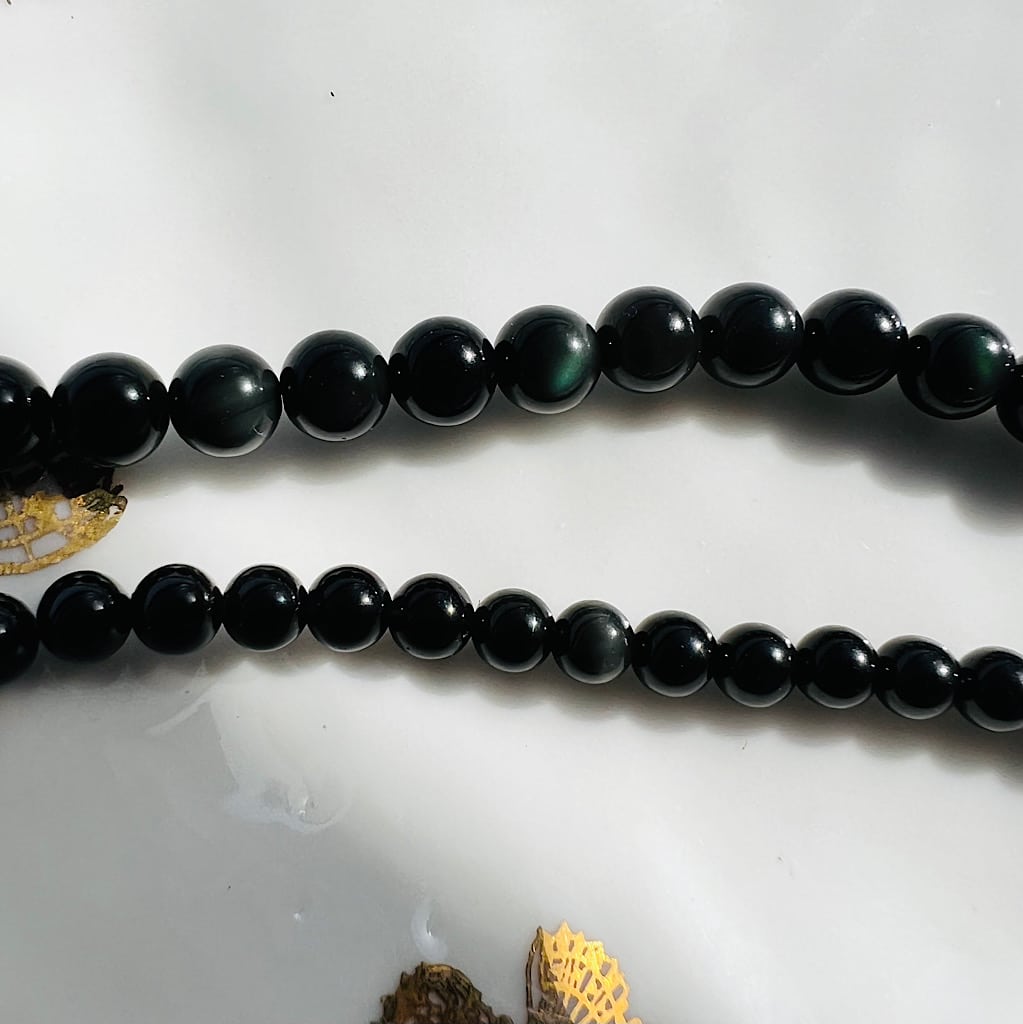 Perles rondes en Obsidienne oeil céleste de 6 mm ( rang de env 60 perles )