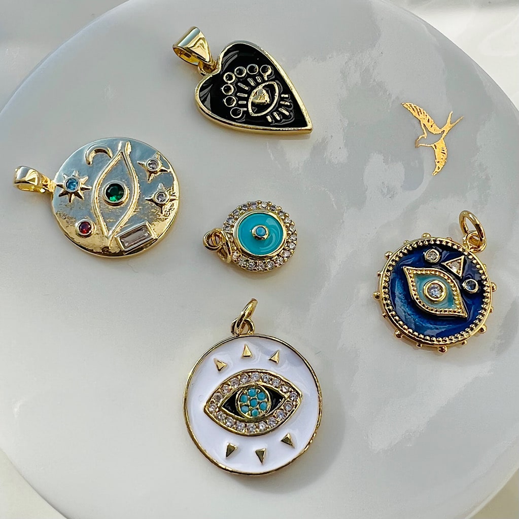 Breloques " oeil " en laiton plaqué or 18k de 22 mm ( à l&