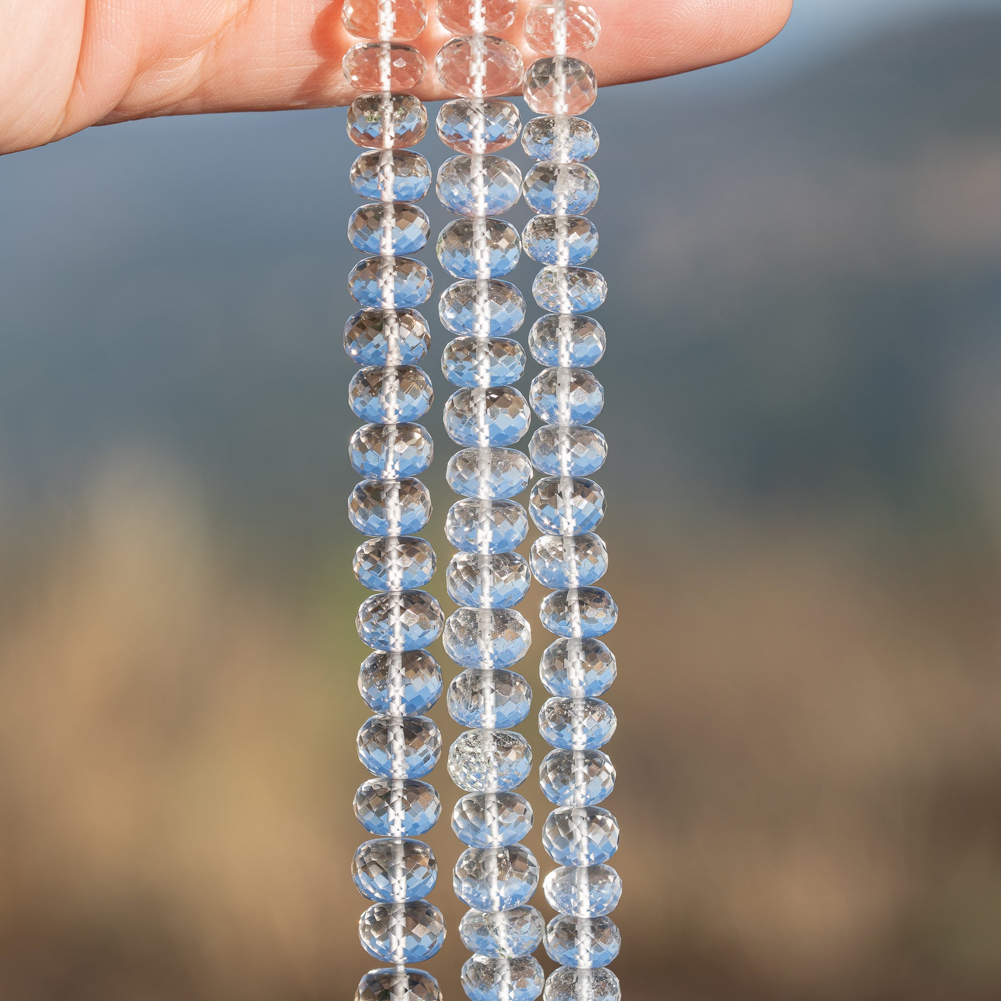 Fils de 20 cm de perles rondelles facettes de cristal de roche de env 7/8 mm
