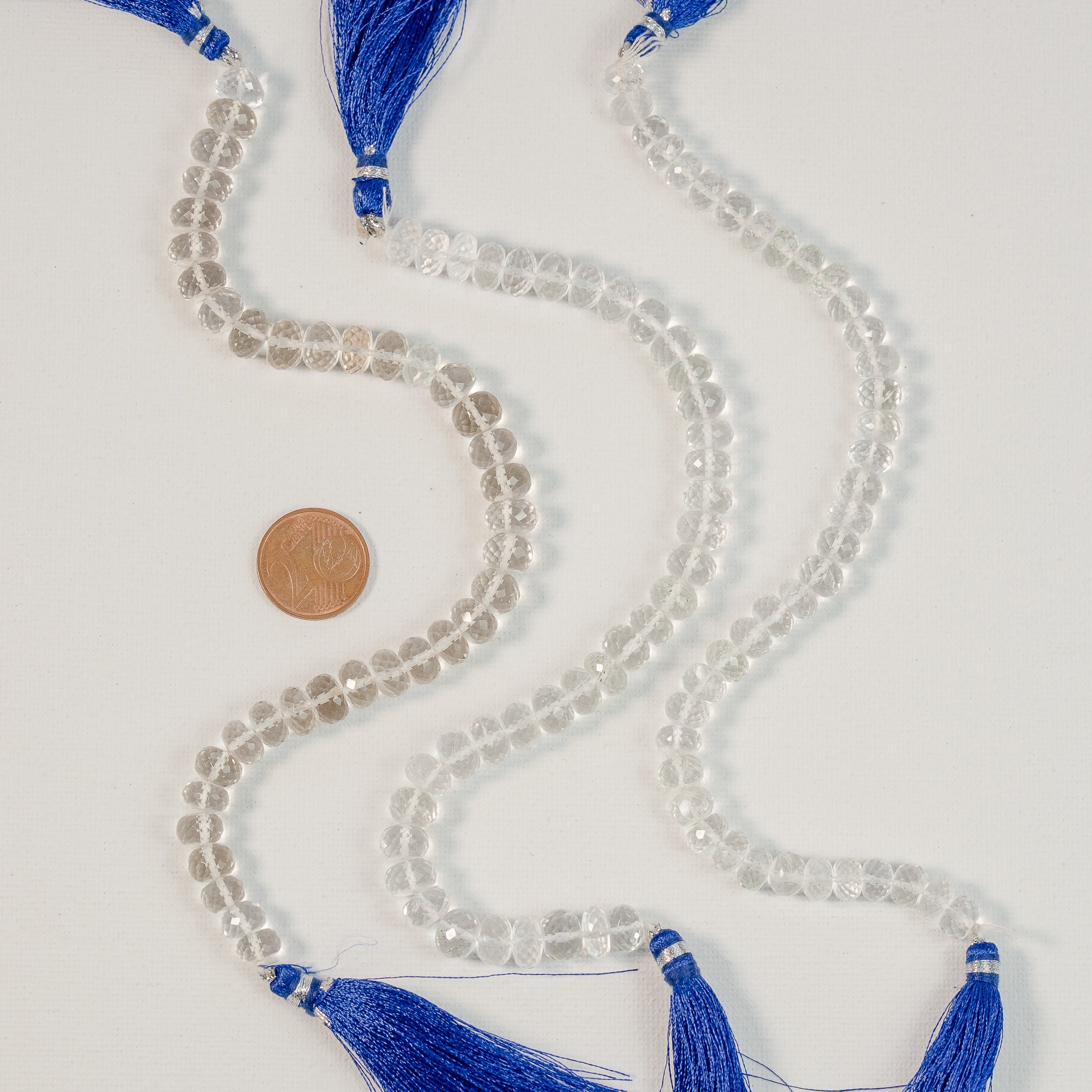 Fils de 20 cm de perles rondelles facettes de cristal de roche de env 7/8 mm