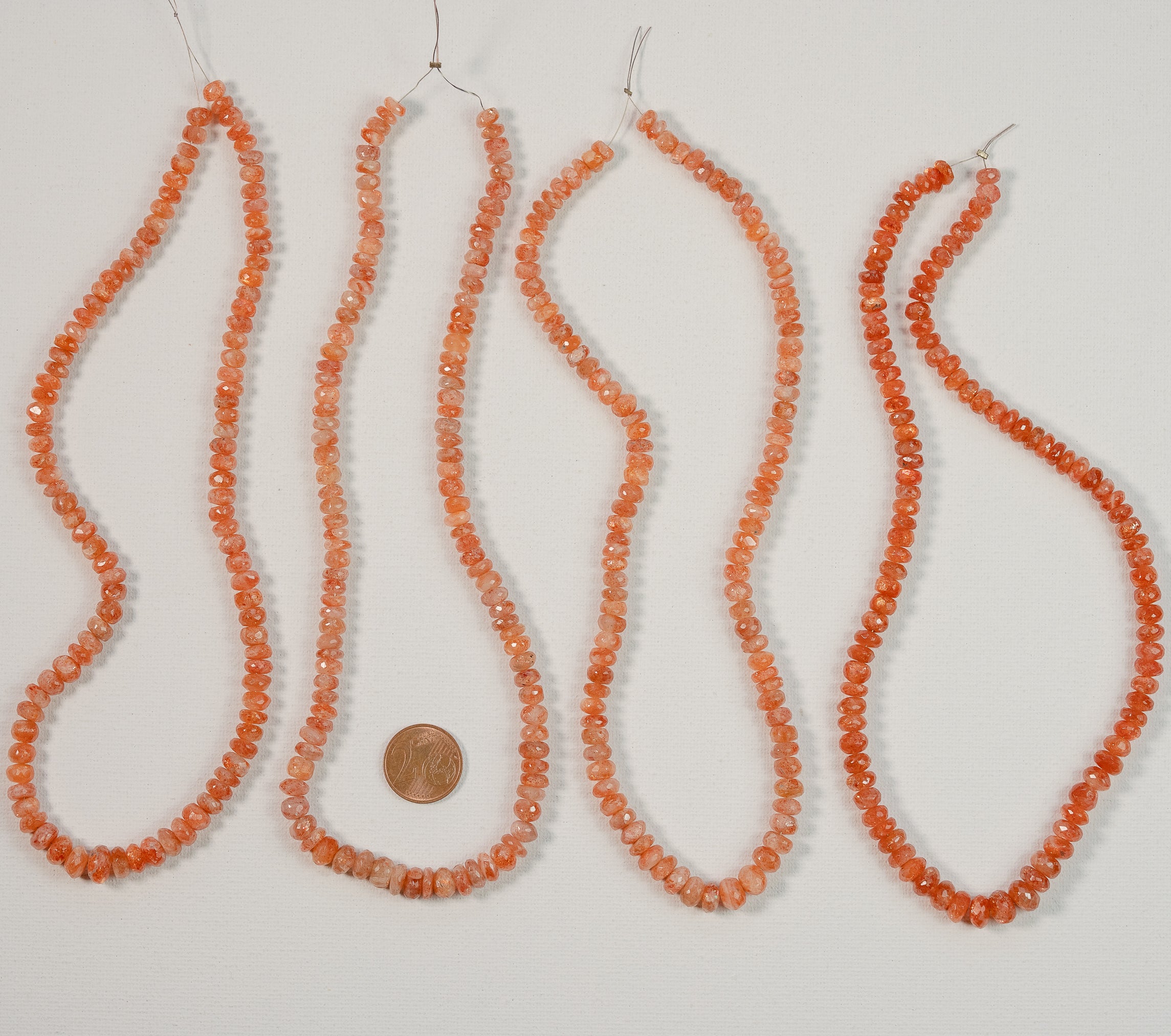 Fils de 40 cm de perles rondelles facettes de Pierre de soleil de 6 à 9 mm