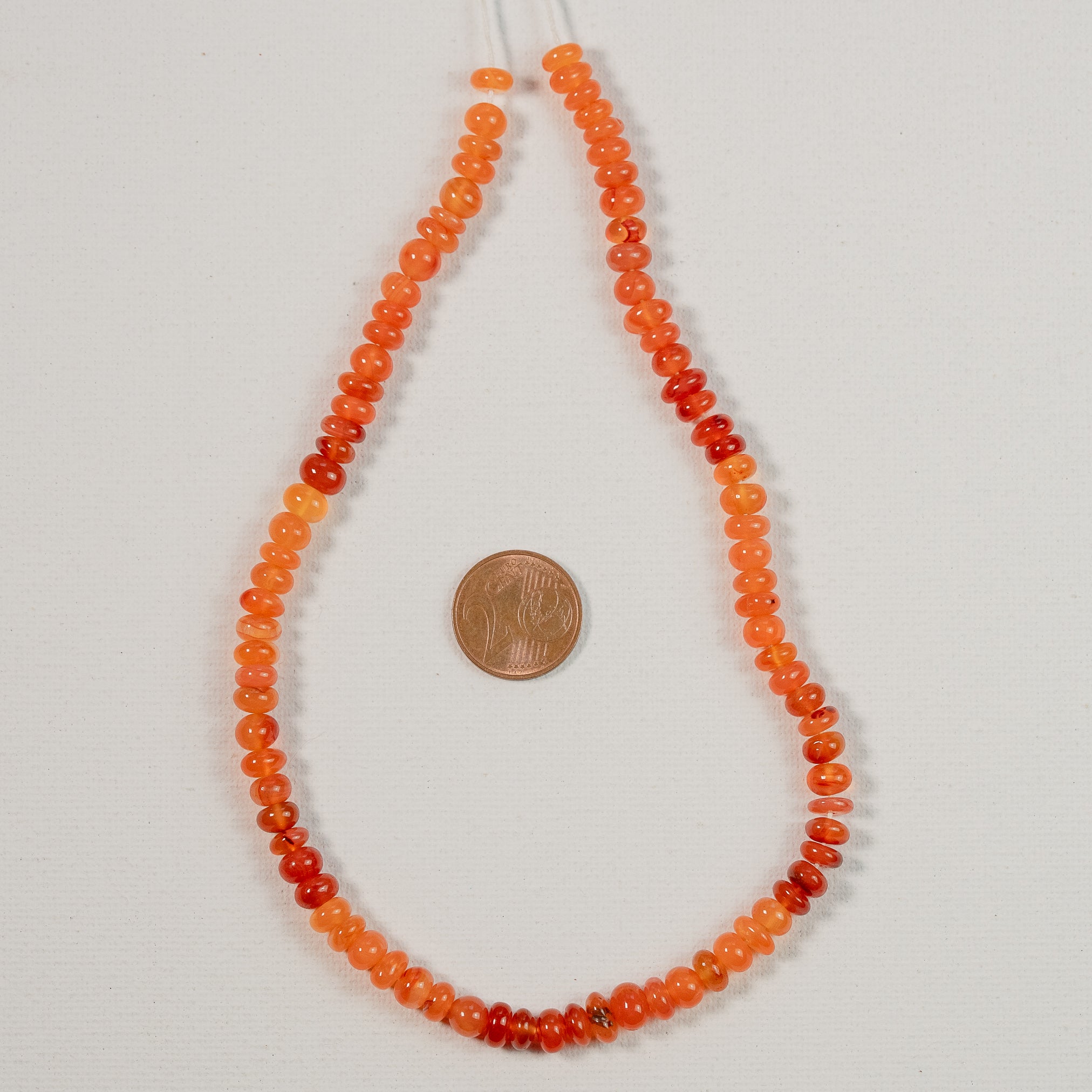 Fil de 33 cm de perles rondelles lisses de Cornaline de env 6/6,5 x 3/5 mm