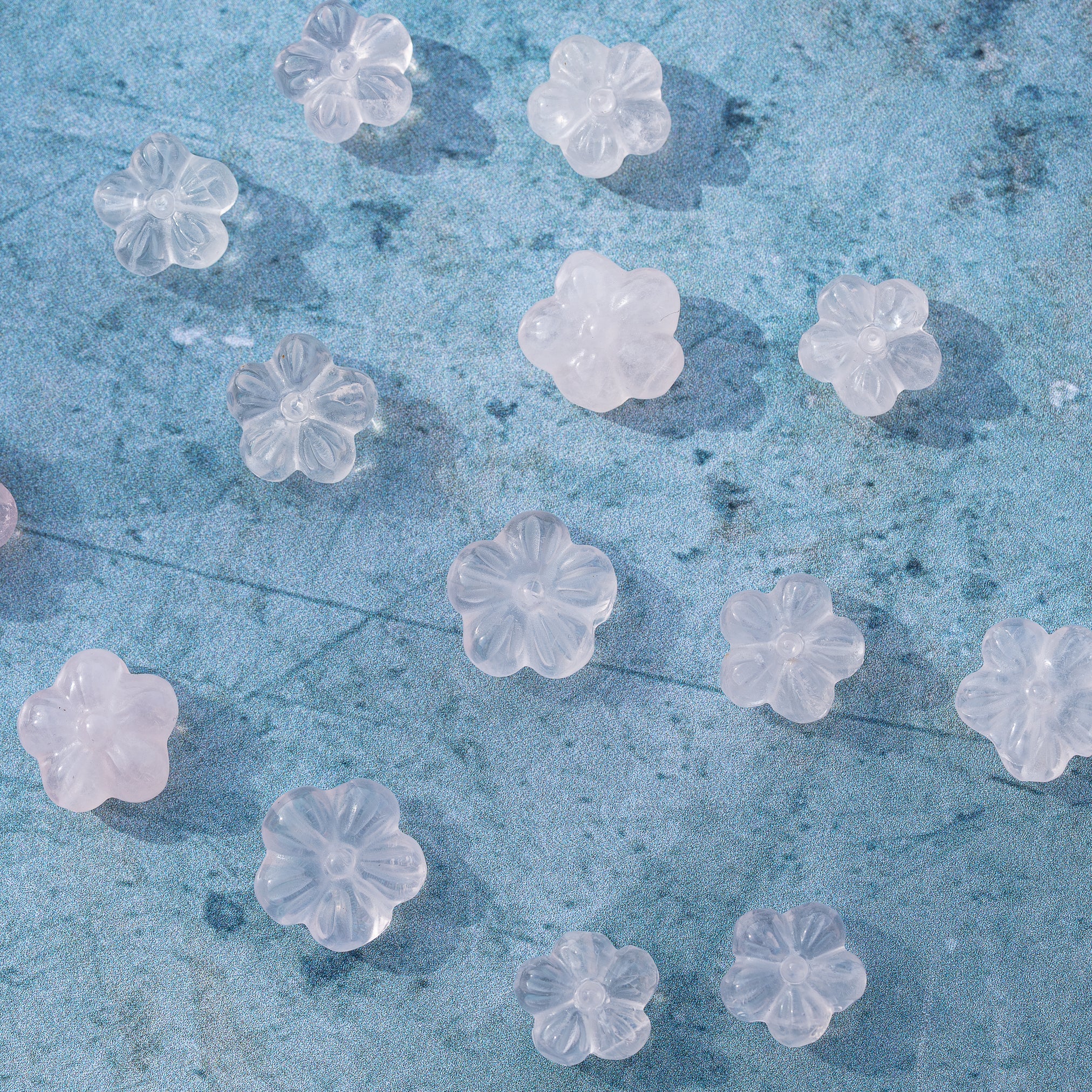 Perles sculptées fleur en Quartz rose au choix de env 11/13 mm ( à l&