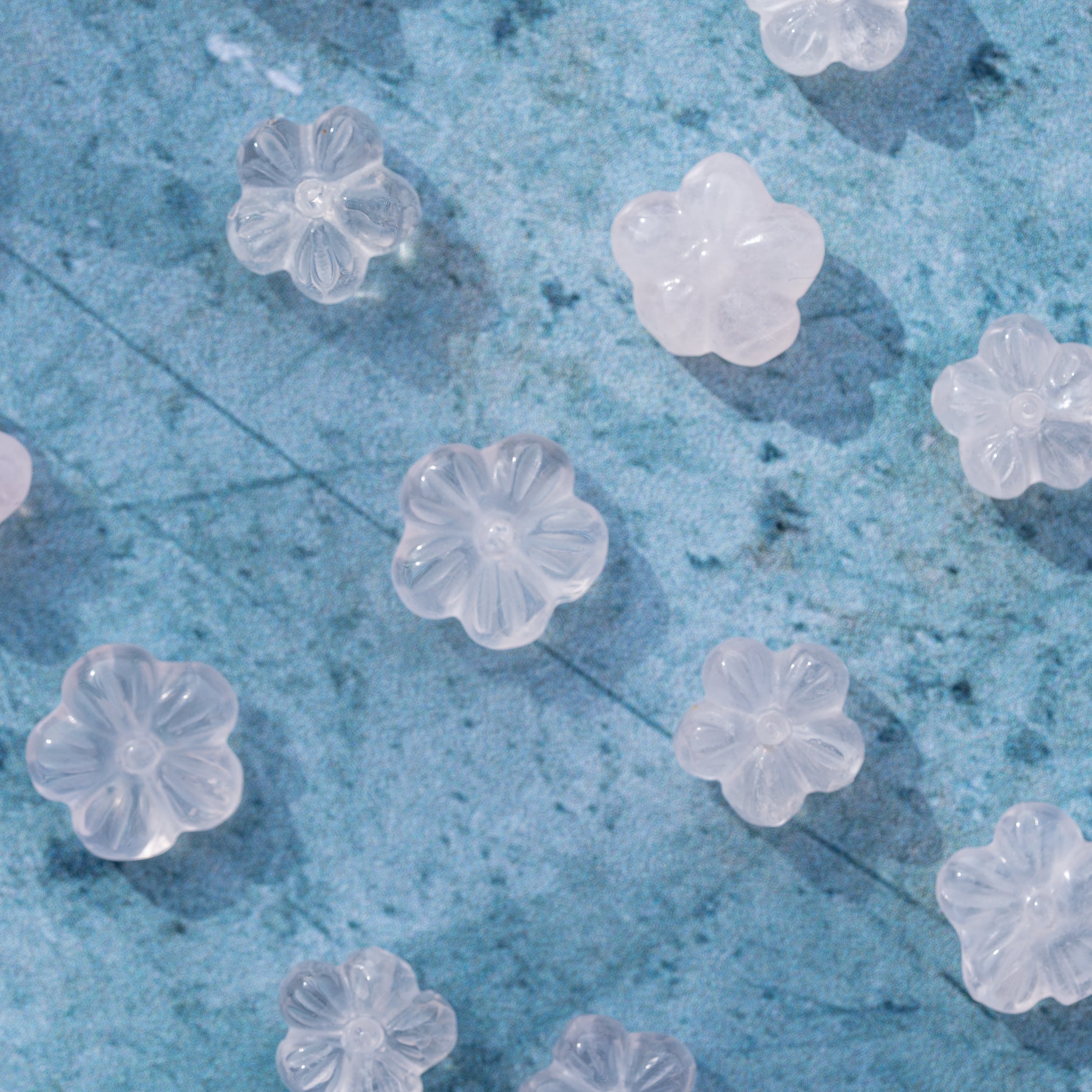 Perles sculptées fleur en Quartz rose au choix de env 11/13 mm ( à l&