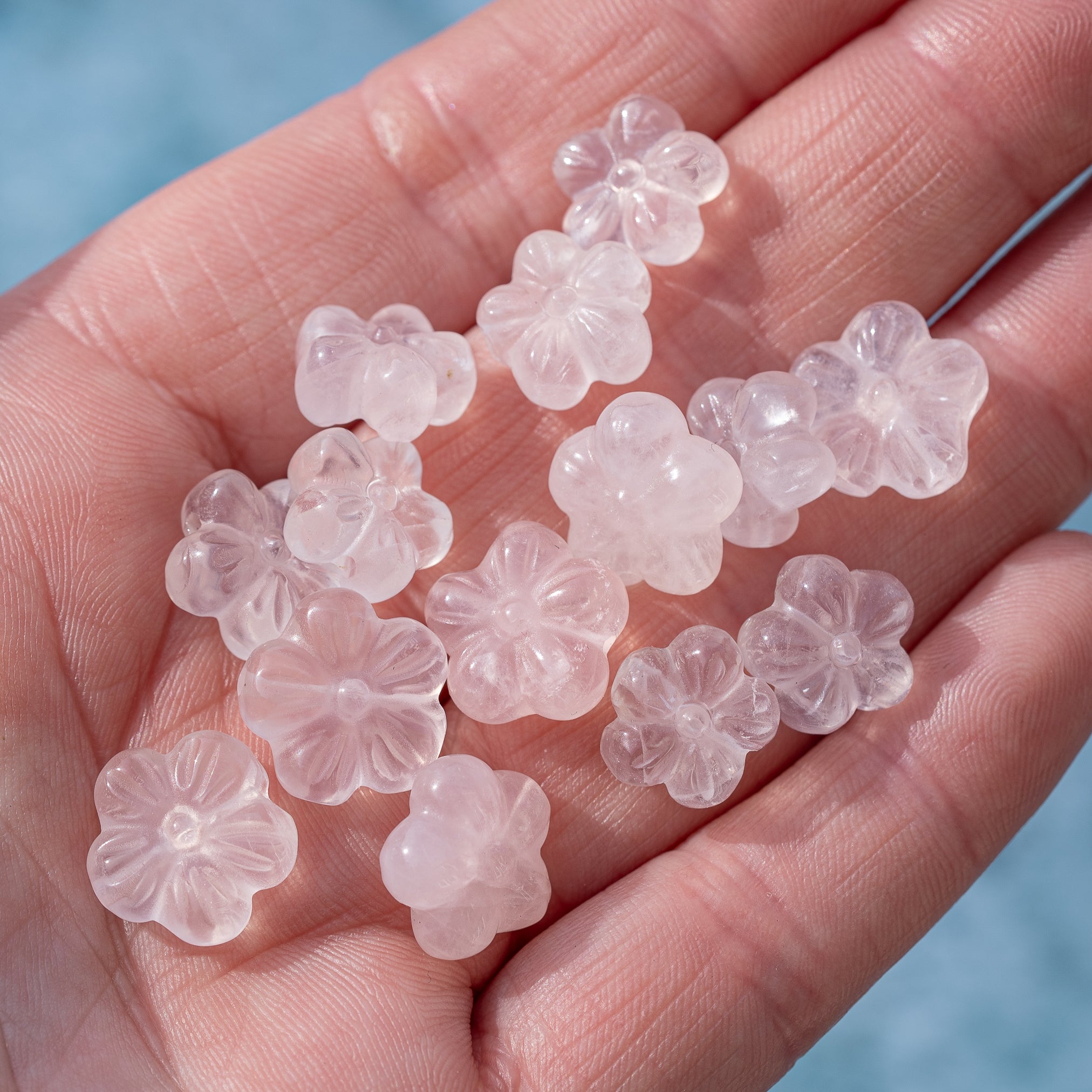 Perles sculptées fleur en Quartz rose au choix de env 11/13 mm ( à l&