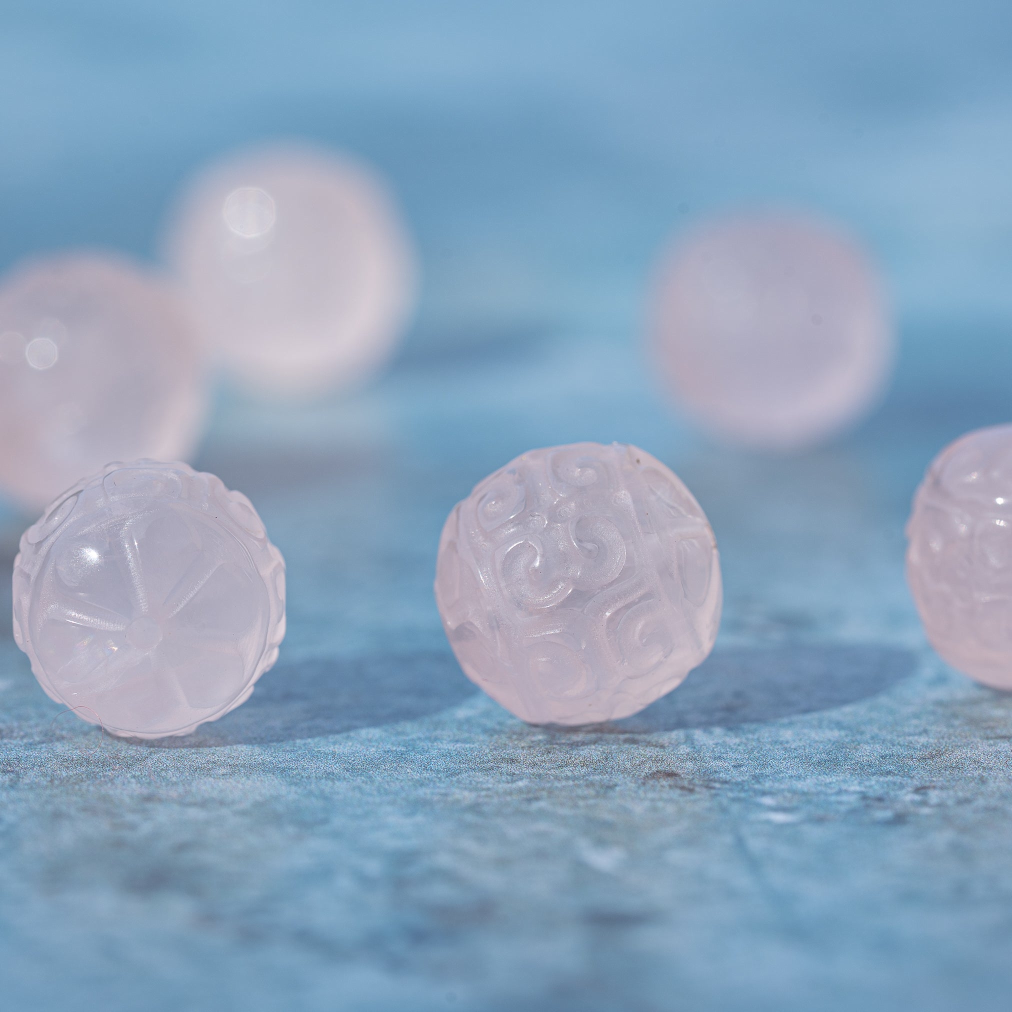 Perles sculptées rondes en Quartz rose au choix de env 13 mm ( à l&