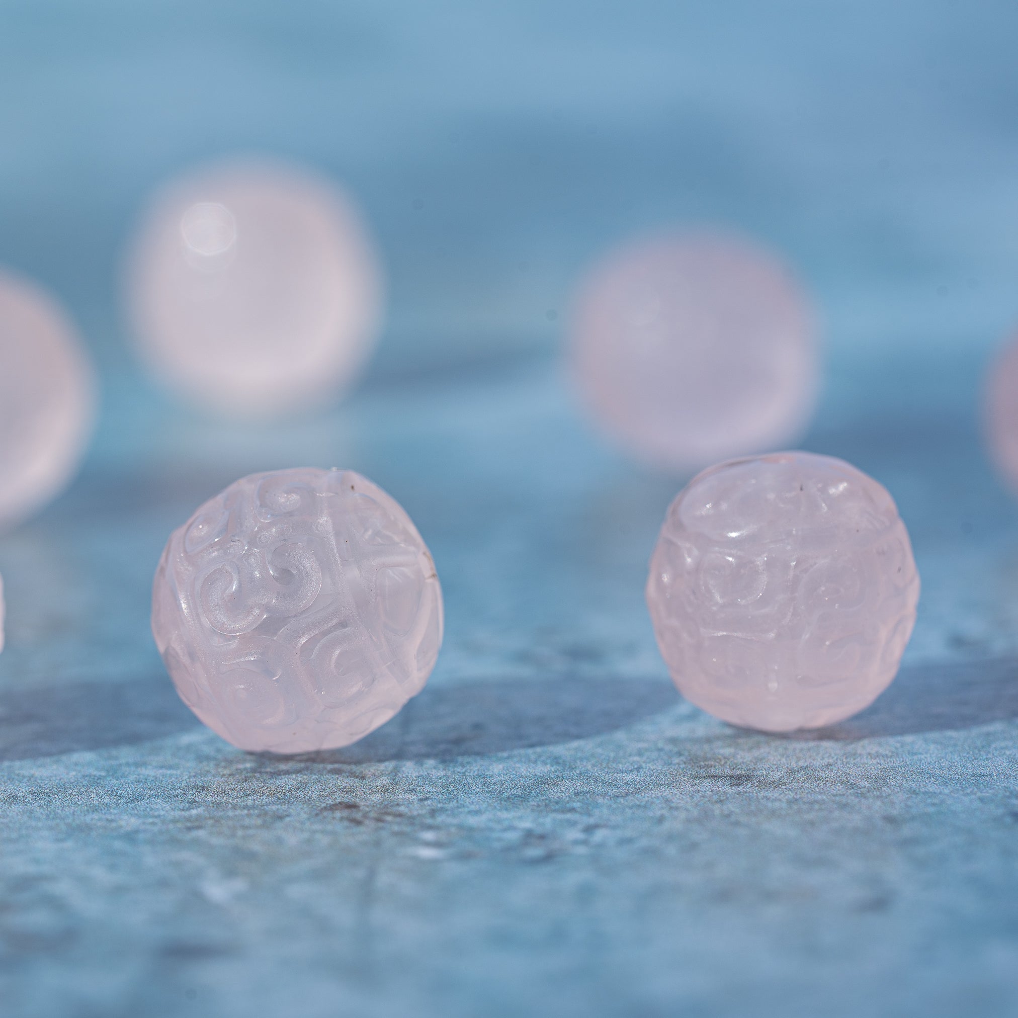 Perles sculptées rondes en Quartz rose au choix de env 13 mm ( à l&