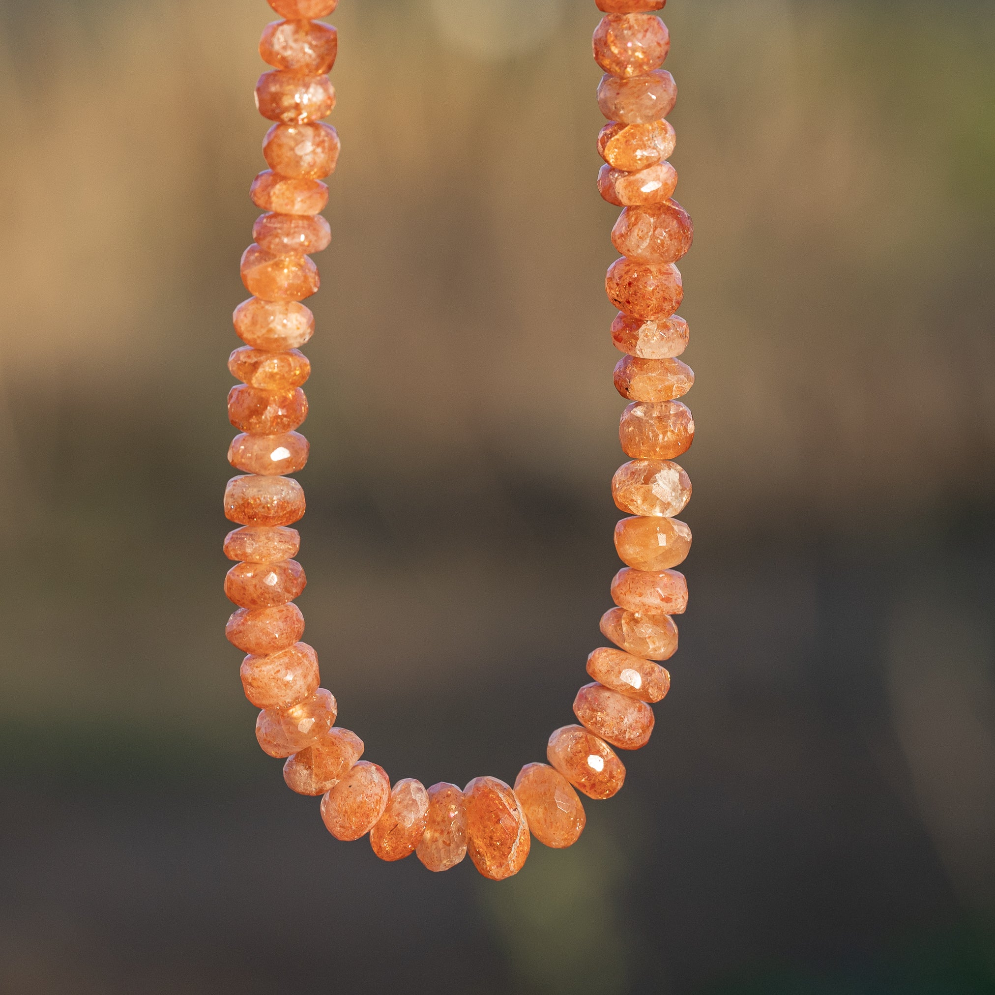 Fils de 40 cm de perles rondelles facettes de Pierre de soleil de 6 à 9 mm