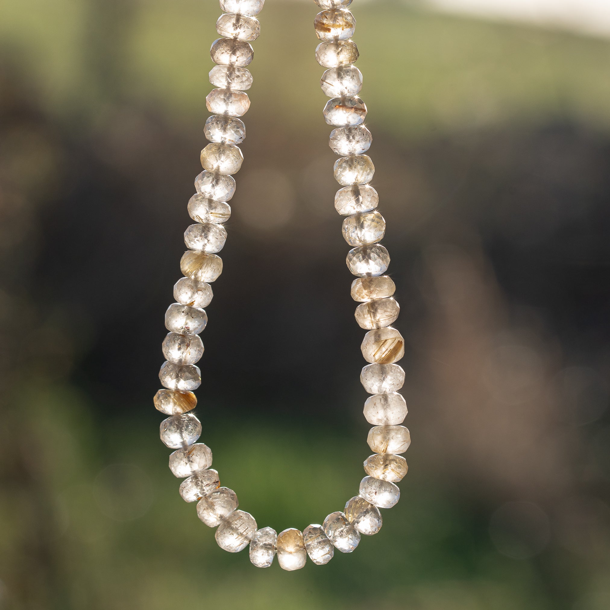 Fil de env 33 cm de perles rondelles facettes de Quartz Rutile doré de 7/8 mm