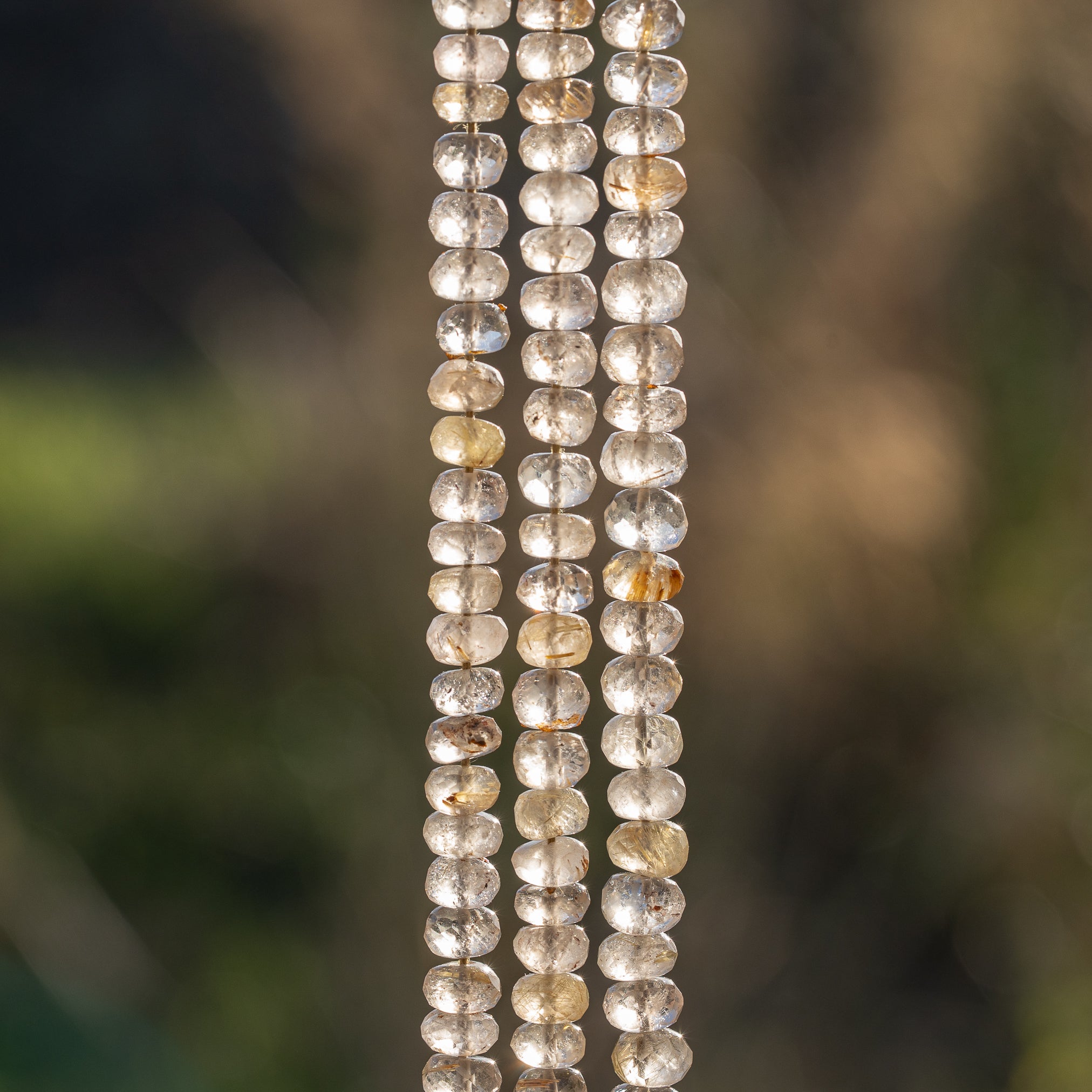 Fil de env 33 cm de perles rondelles facettes de Quartz Rutile doré de 7/8 mm
