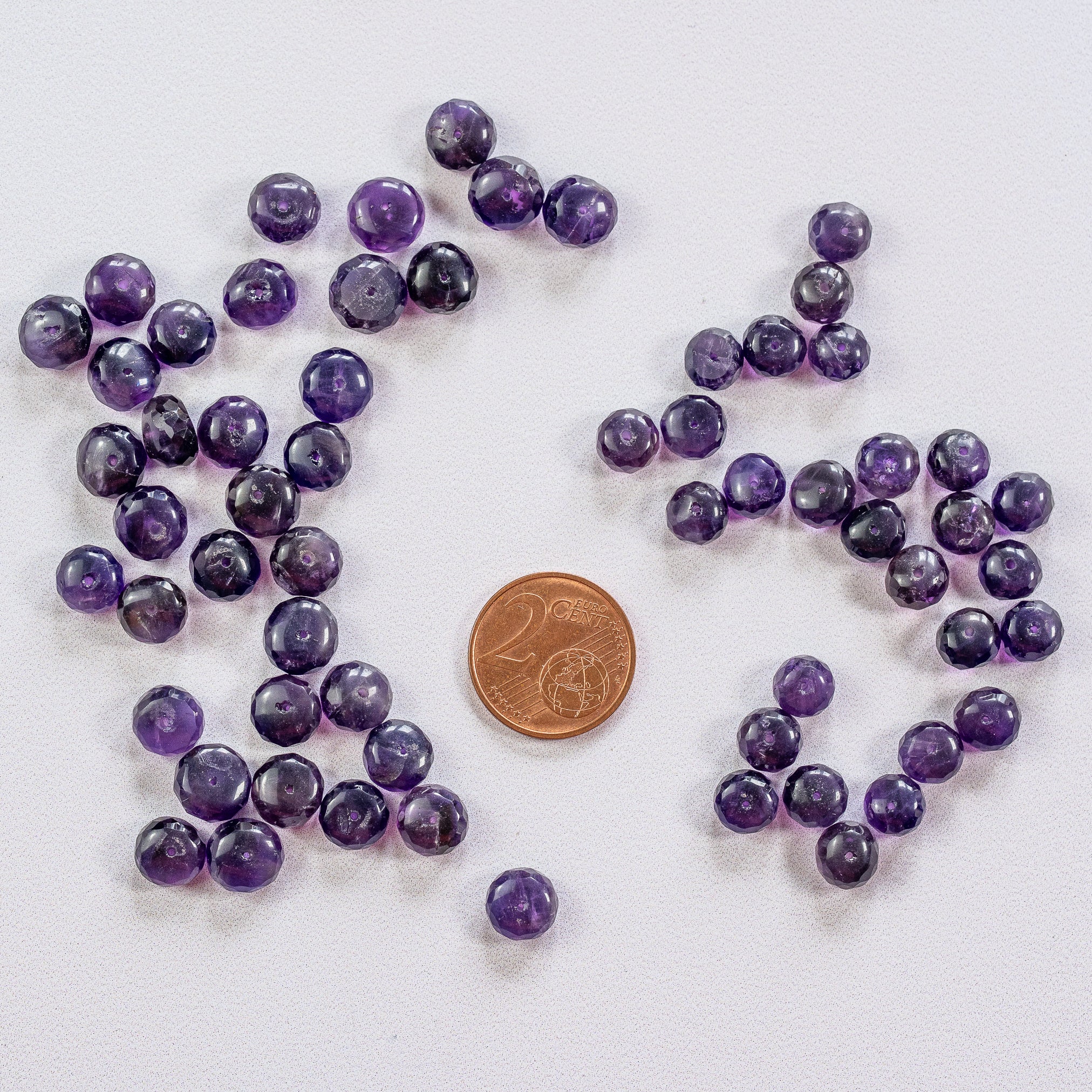 Perles rondelles facettes en Améthyste de 6,5 à 8,5 mm ( lot de 2 )