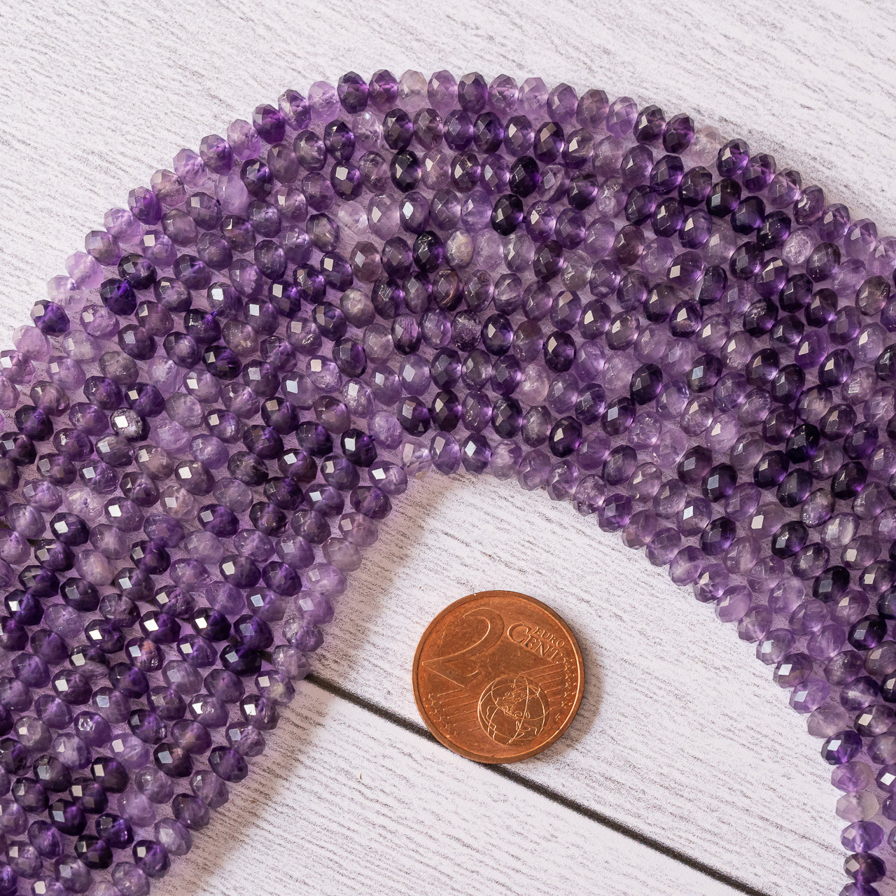 Perles rondelles facettes en Améthyste de 4,5/5 x 3 mm ( rang de env 120 perles )