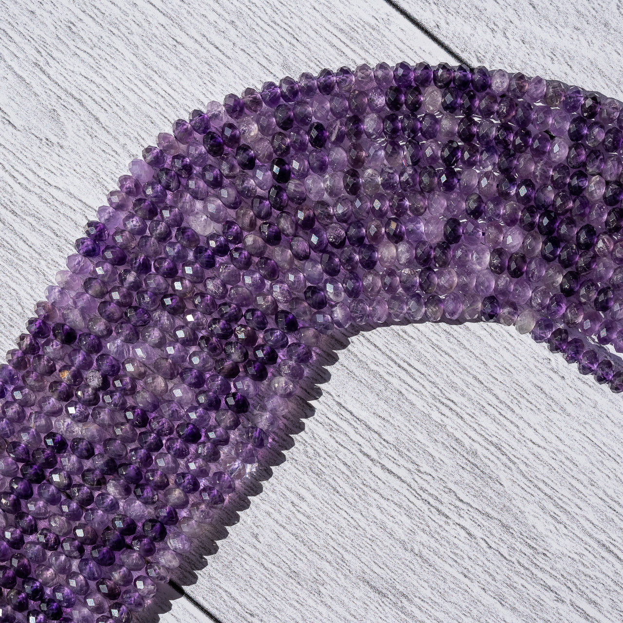 Perles rondelles facettes en Améthyste de 4,5/5 x 3 mm ( rang de env 120 perles )