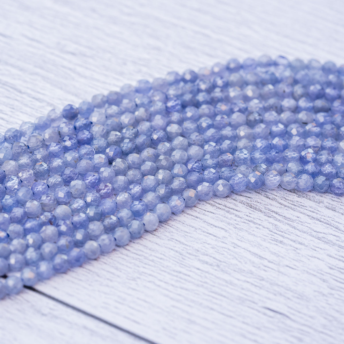 Perles rondes facettes de Tanzanite de 3 mm ( Rang ou 1/2 rang )