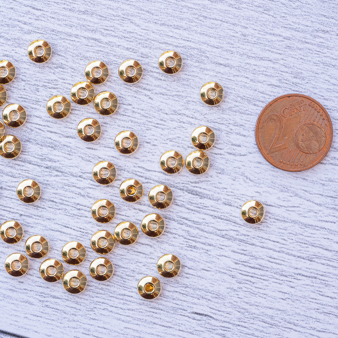 Perles rondelles toupies en acier inoxydable plaqué or 24k de 6 x 3 mm ( lot de 6 )