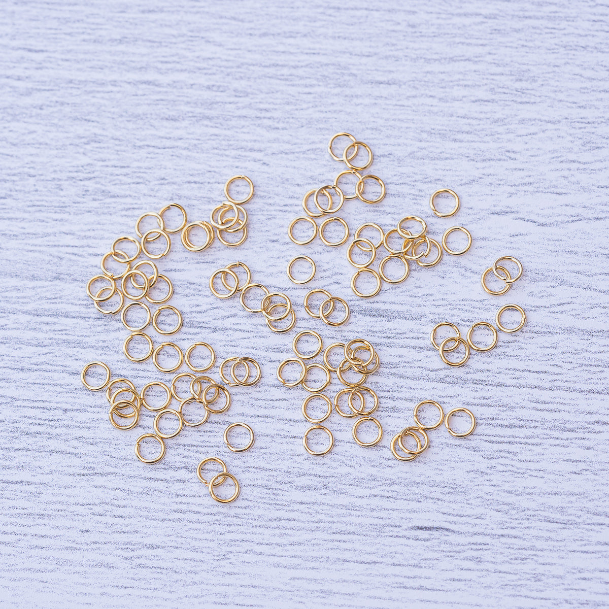 Anneaux de jonction fins en acier inox plaqués or de 4 x 0,5 ou 0,6 mm au choix ( lot de 10 )