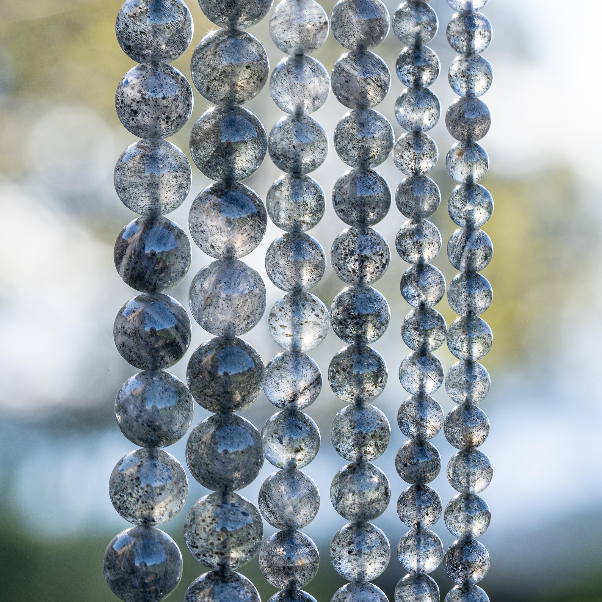 Perles rondes lisses de Quartz à Biotite de 6, 8 ou 10 mm ( Rang ou 1/2 rang )