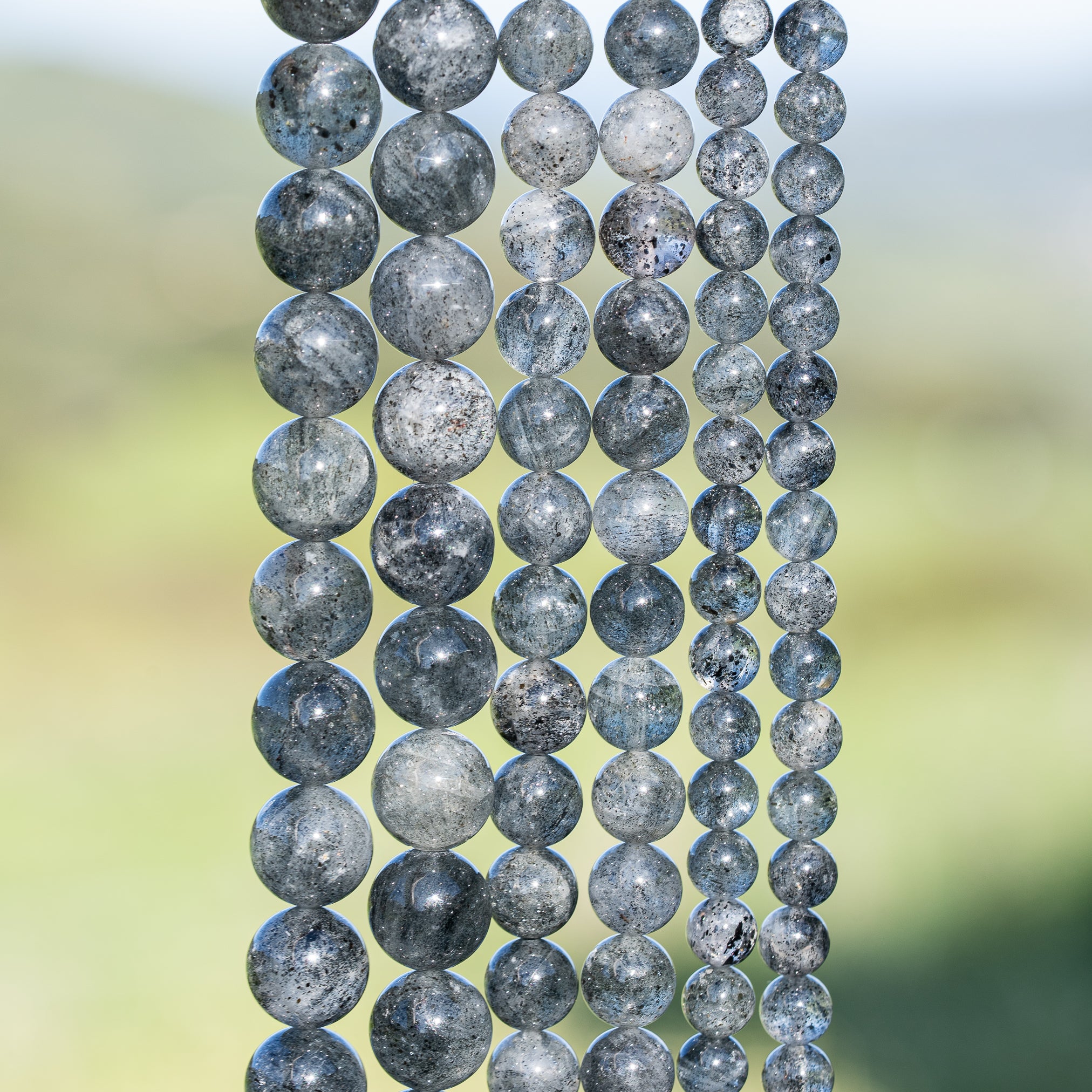 Perles rondes lisses de Quartz à Biotite de 6, 8 ou 10 mm ( Rang ou 1/2 rang )