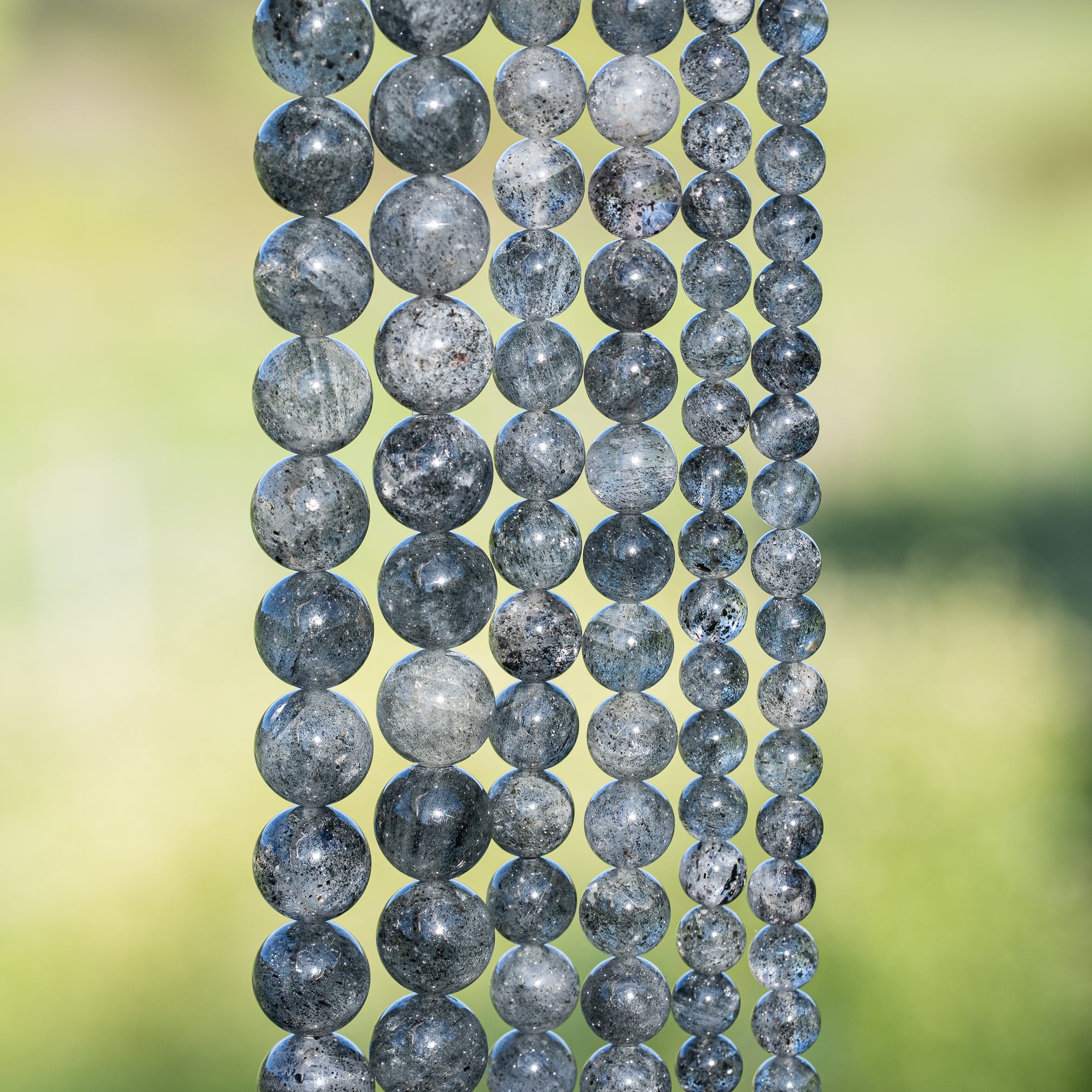 Perles rondes lisses de Quartz à Biotite de 6, 8 ou 10 mm ( Rang ou 1/2 rang )