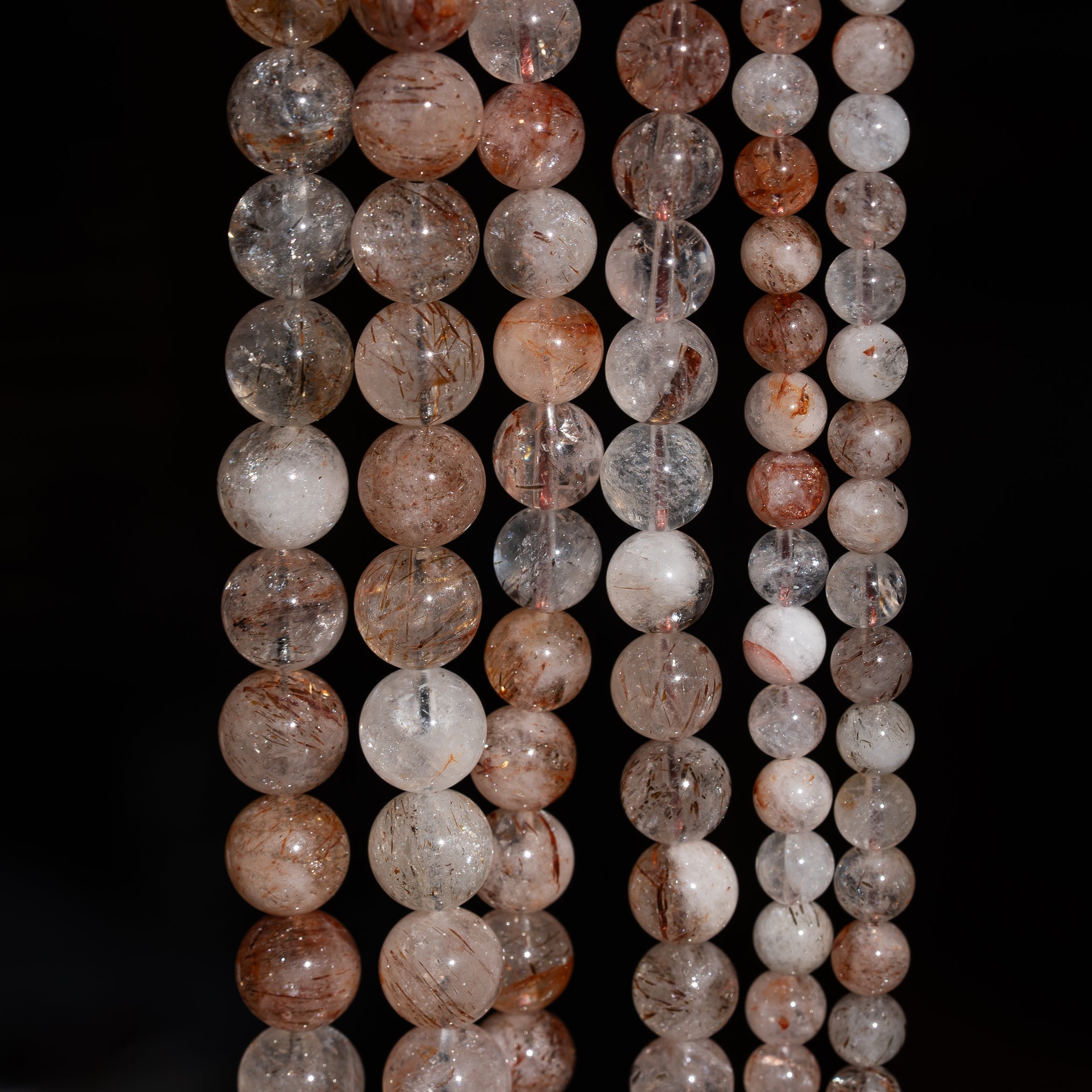 Perles rondes lisses de Quartz à inclusions de Rutile rouge de 6, 8 ou 10 mm ( Rang ou 1/2 rang )