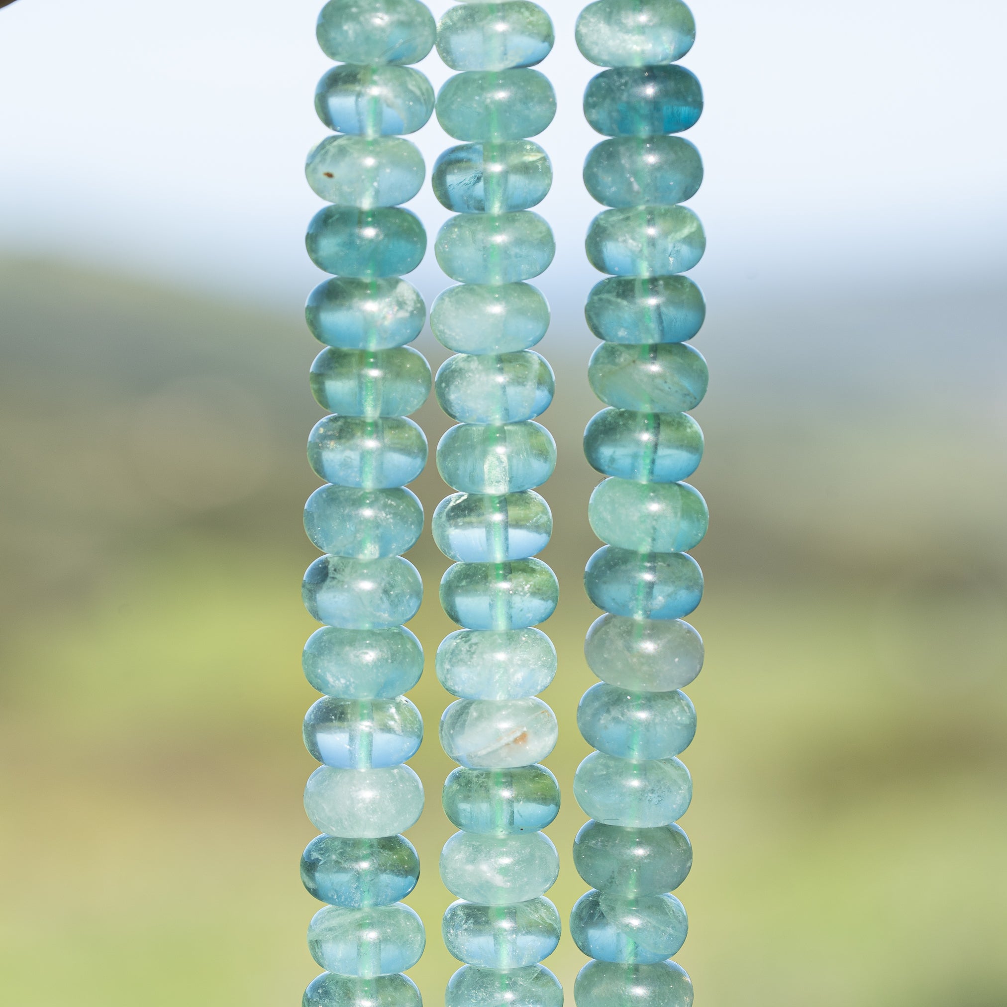 Perles rondelles lisses de Fluorite verte/bleue de env 10 x 6 mm ( lot de 10 )