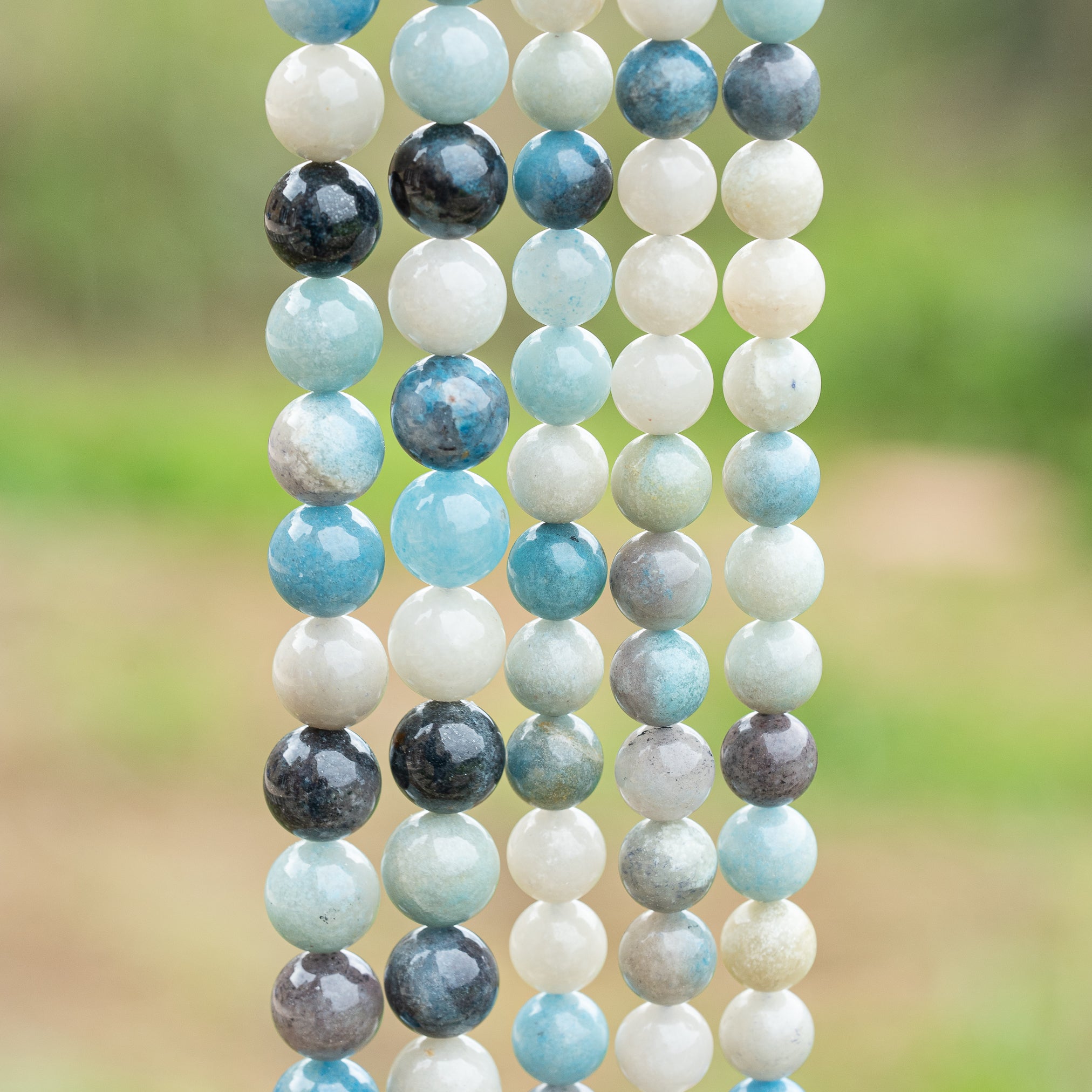 Perles rondes lisses de Quartz à Trolleite de 8,5 ou 10 mm au choix ( 1/2 rang 24 ou 20 perles )