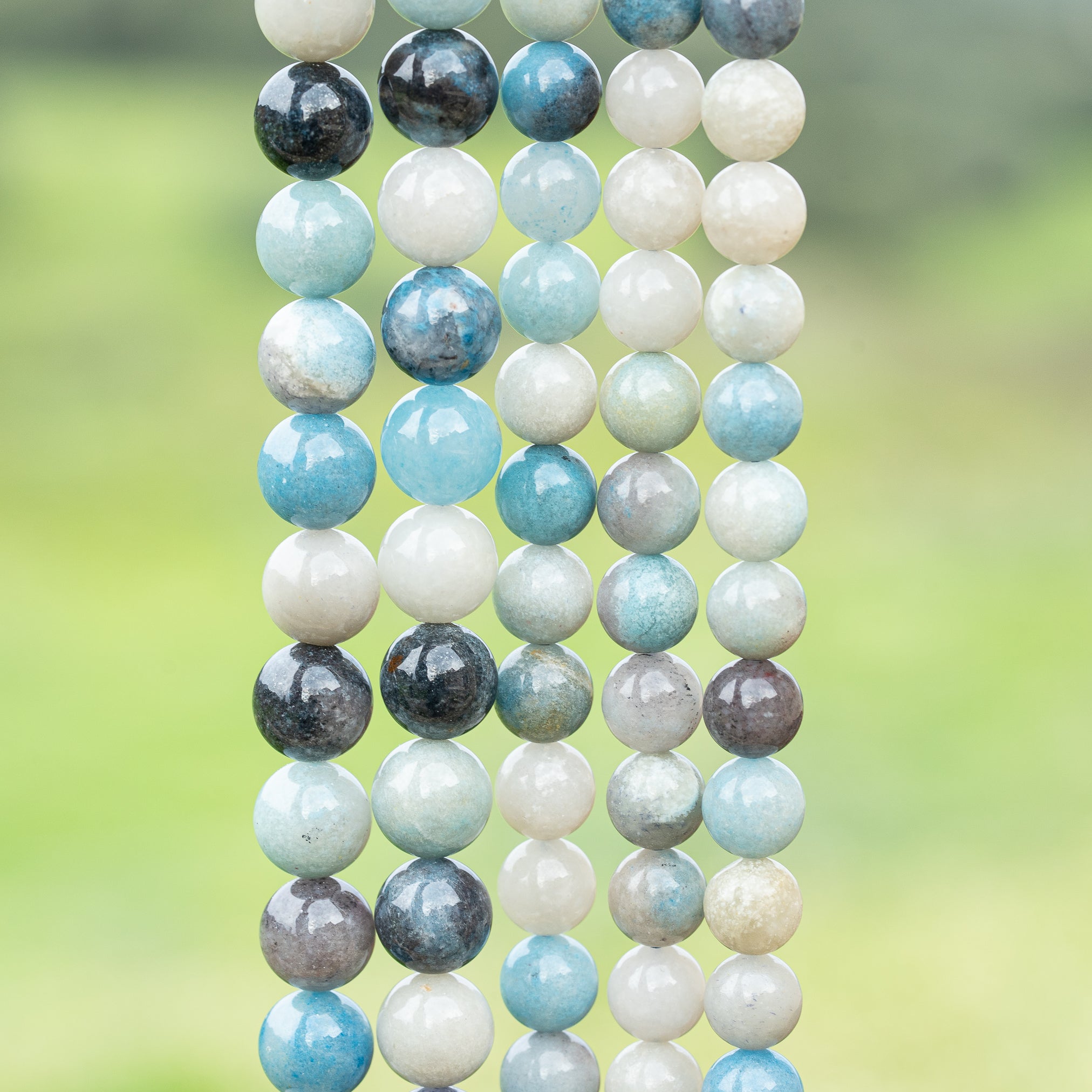 Perles rondes lisses de Quartz à Trolleite de 8,5 ou 10 mm au choix ( 1/2 rang 24 ou 20 perles )