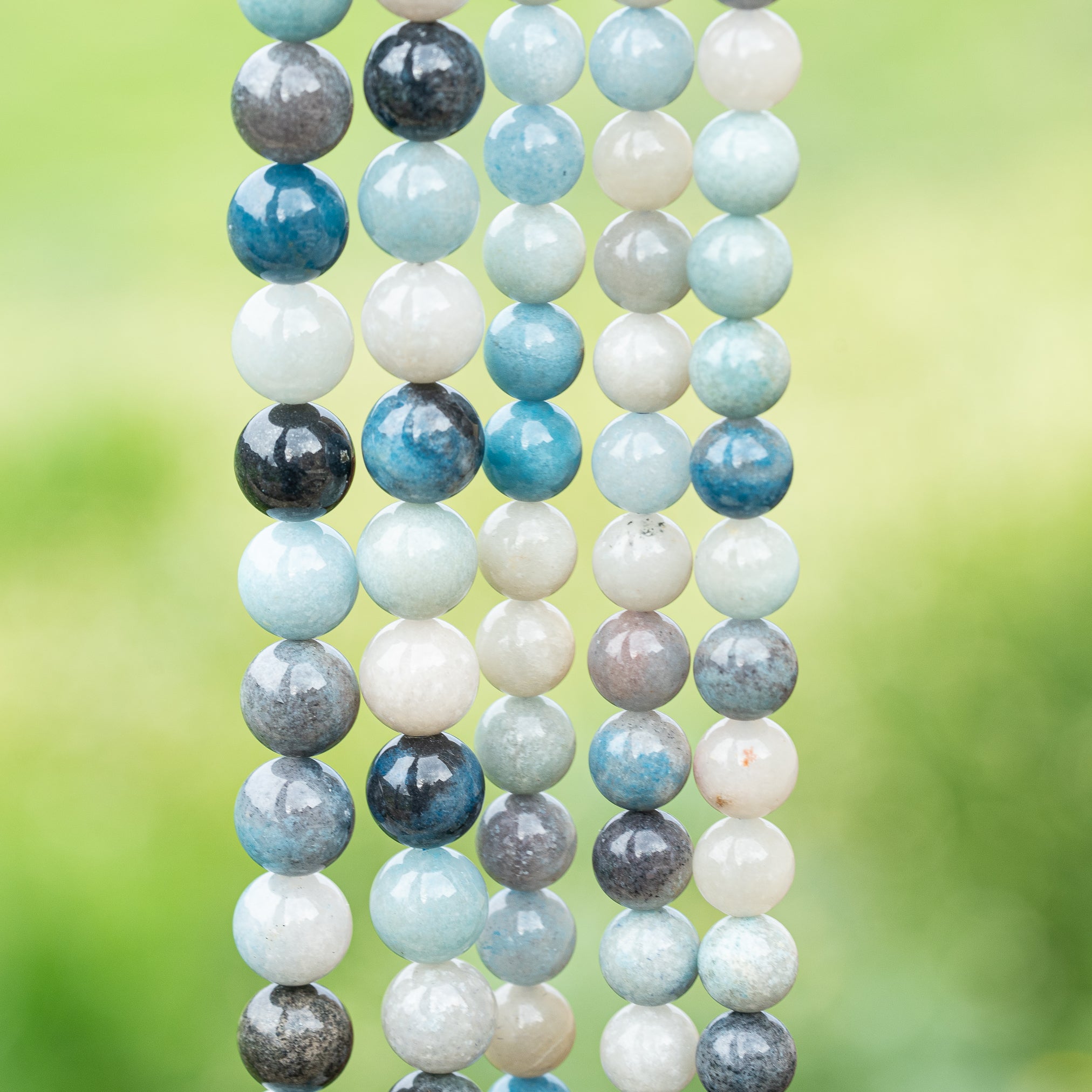 Perles rondes lisses de Quartz à Trolleite de 8,5 ou 10 mm au choix ( 1/2 rang 24 ou 20 perles )