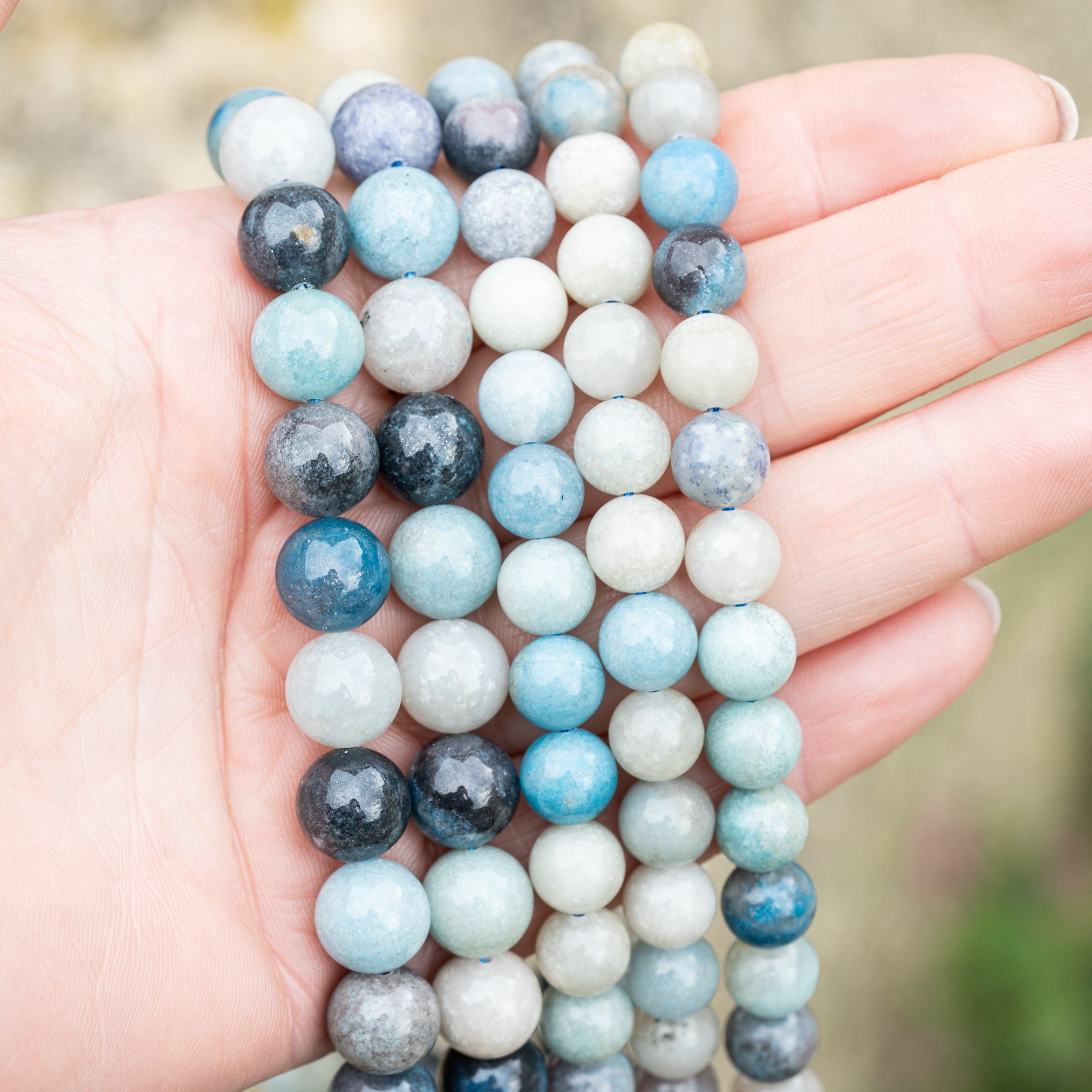 Perles rondes lisses de Quartz à Trolleite de 8,5 ou 10 mm au choix ( 1/2 rang 24 ou 20 perles )