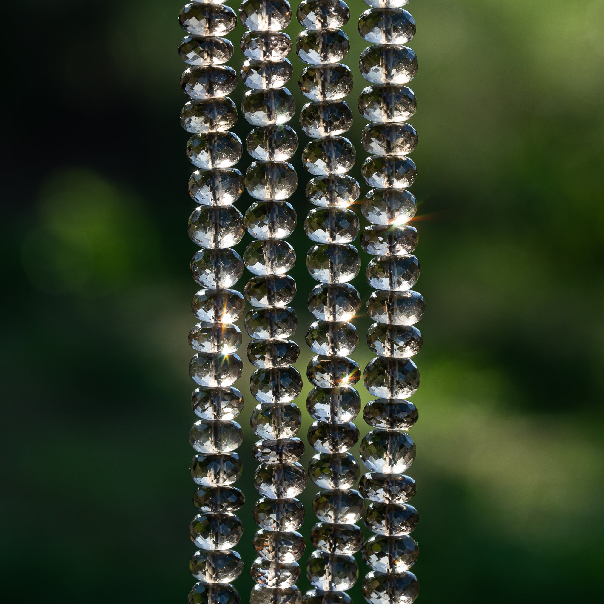 Perles rondelles facettes de quartz fumé de env 7 ou 9 mm ( lot de 2 perles )