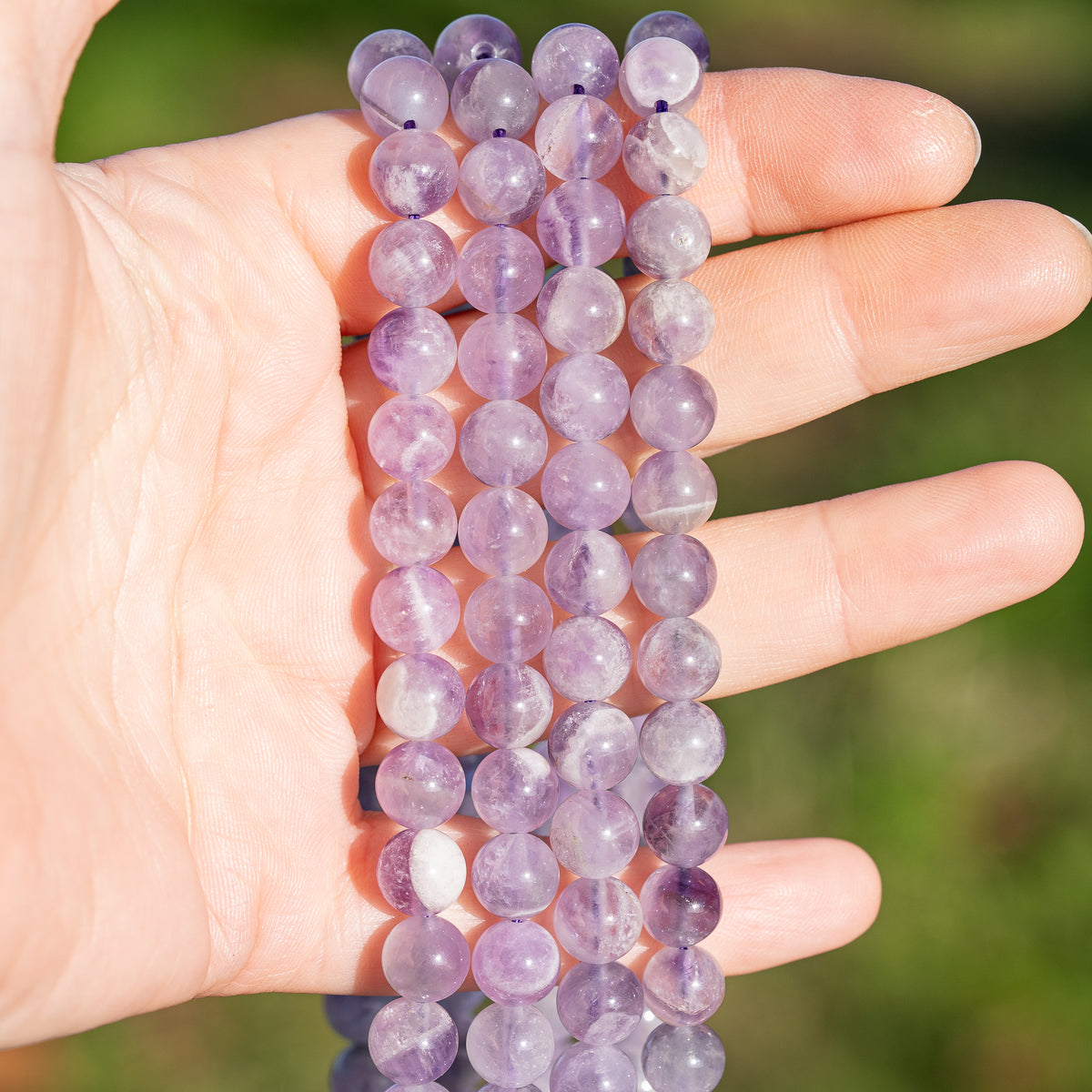Perles rondes lisses en Améthyste lilas de 8 mm ( rang de env 48 perles )