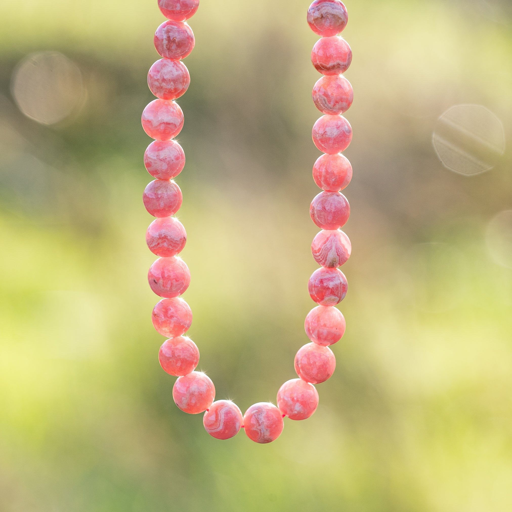 Perles rondes lisses de Rhodochrosite grade A de 7,8 mm ( à l&