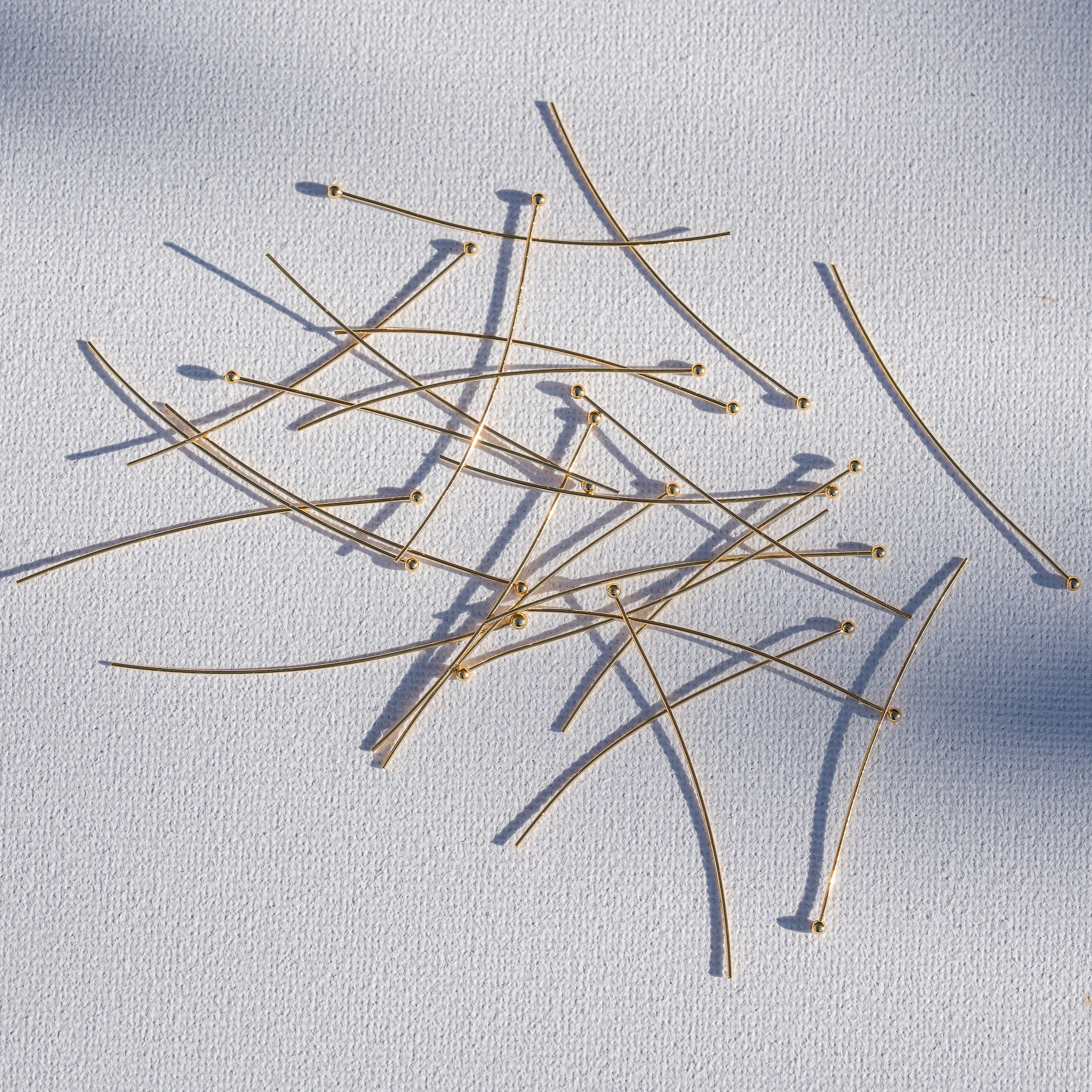 Clous têtes boule en laiton plaqué or 18k de 50 x 0,5 mm ( lot de 10 )