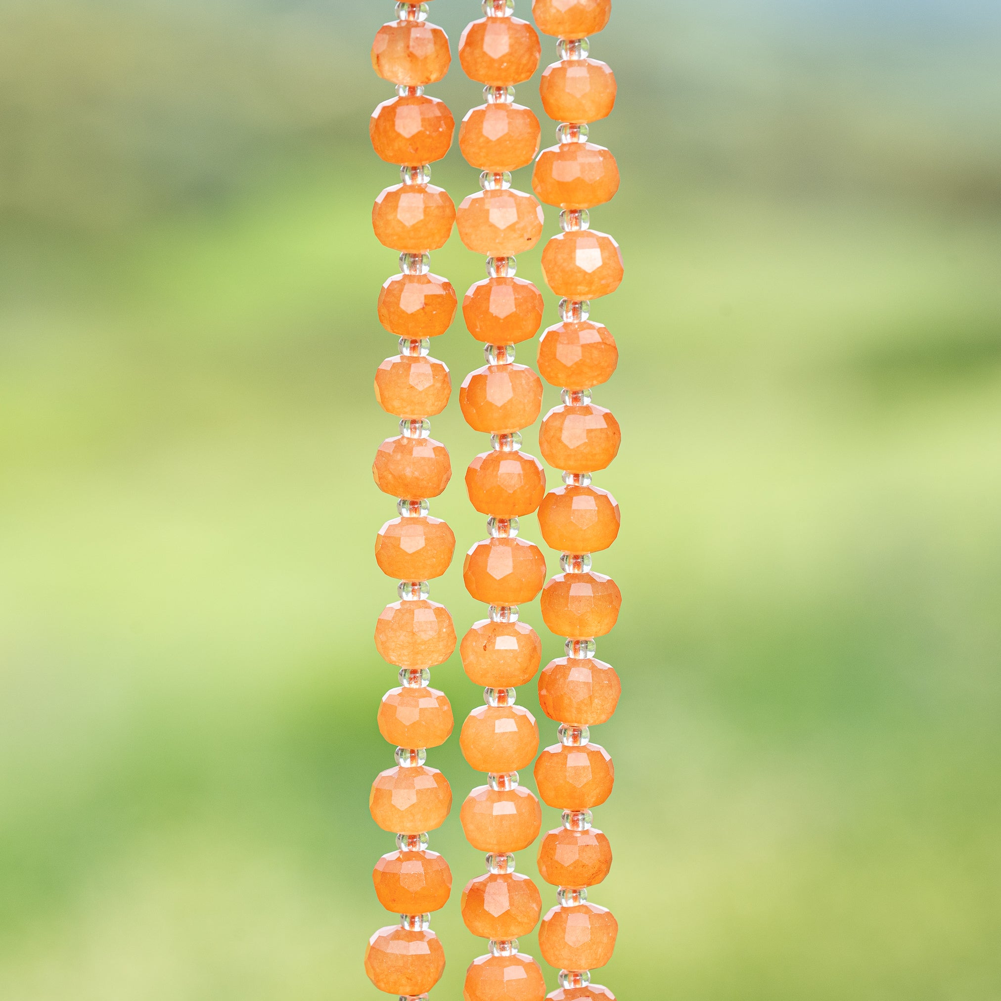 Perles rondelles facettes en Aventurine orange de env 7,5 x 6/6,5 mm ( rang de env 46 perles )