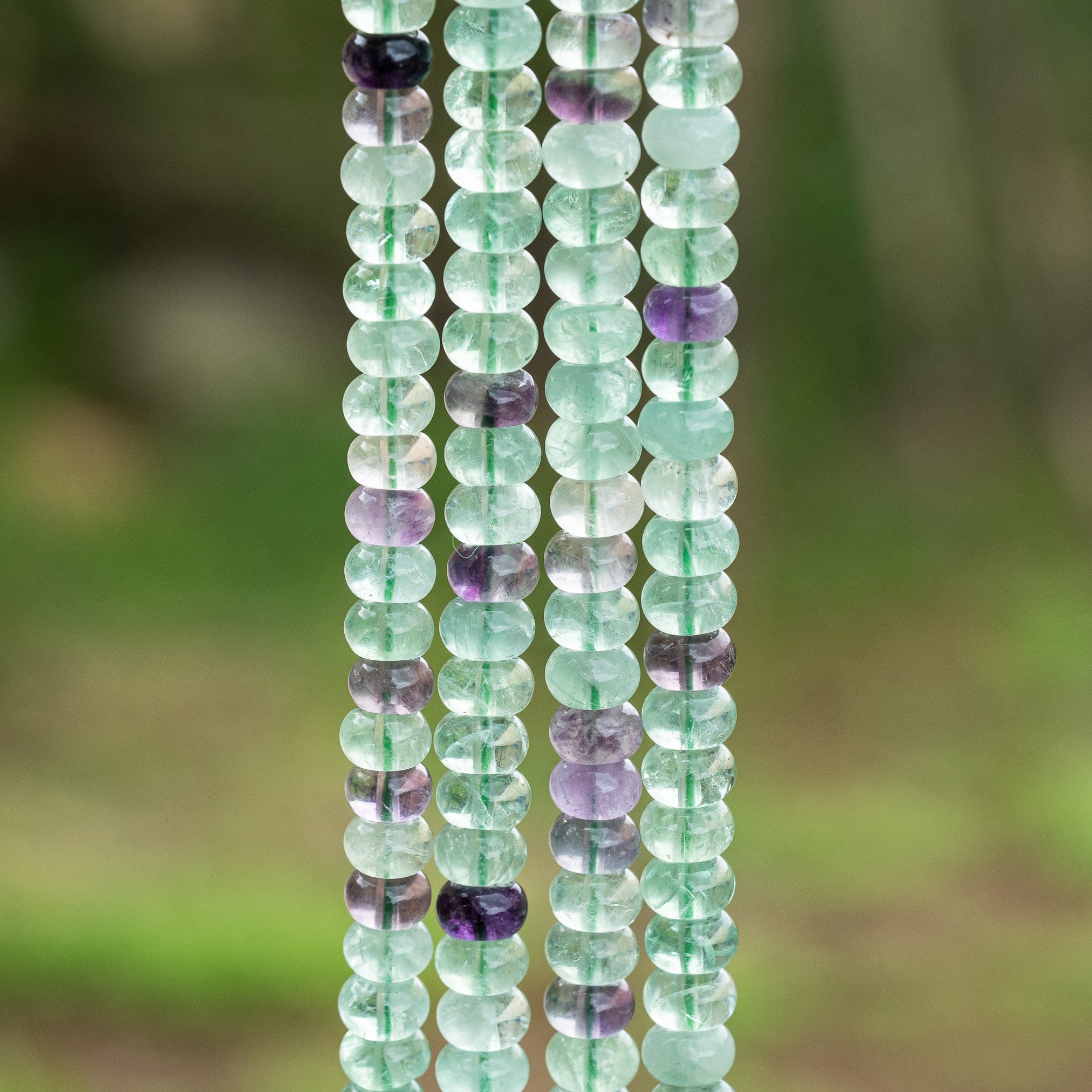 Perles rondelles lisses de Fluorite multicolore de 8 x 5 mm ( 1/2 rang de env 36 perles )