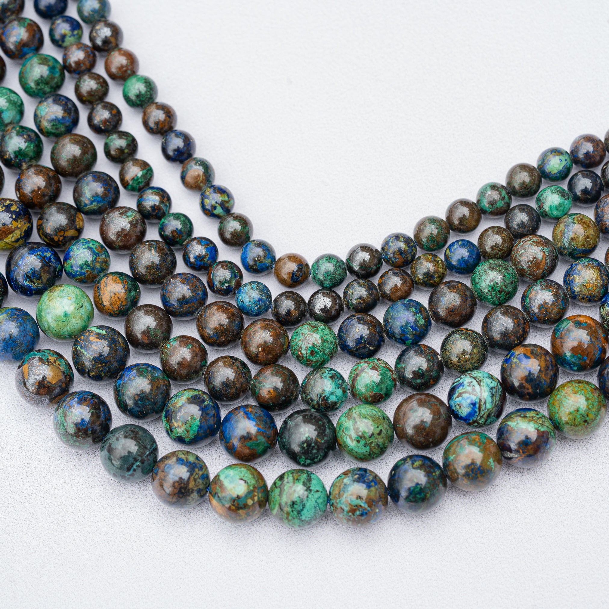 Perles rondes lisses en Azurite/Chrysocolle de 6, 8 ou 10 mm ( 1/4 ou 1/2 rang )
