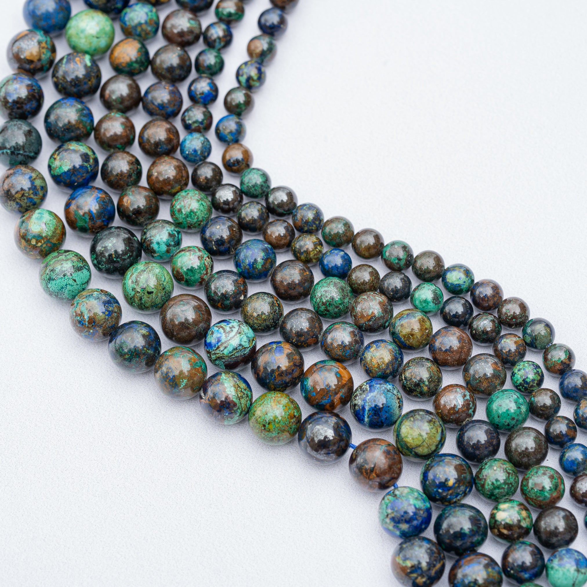 Perles rondes lisses en Azurite/Chrysocolle de 6, 8 ou 10 mm ( 1/4 ou 1/2 rang )