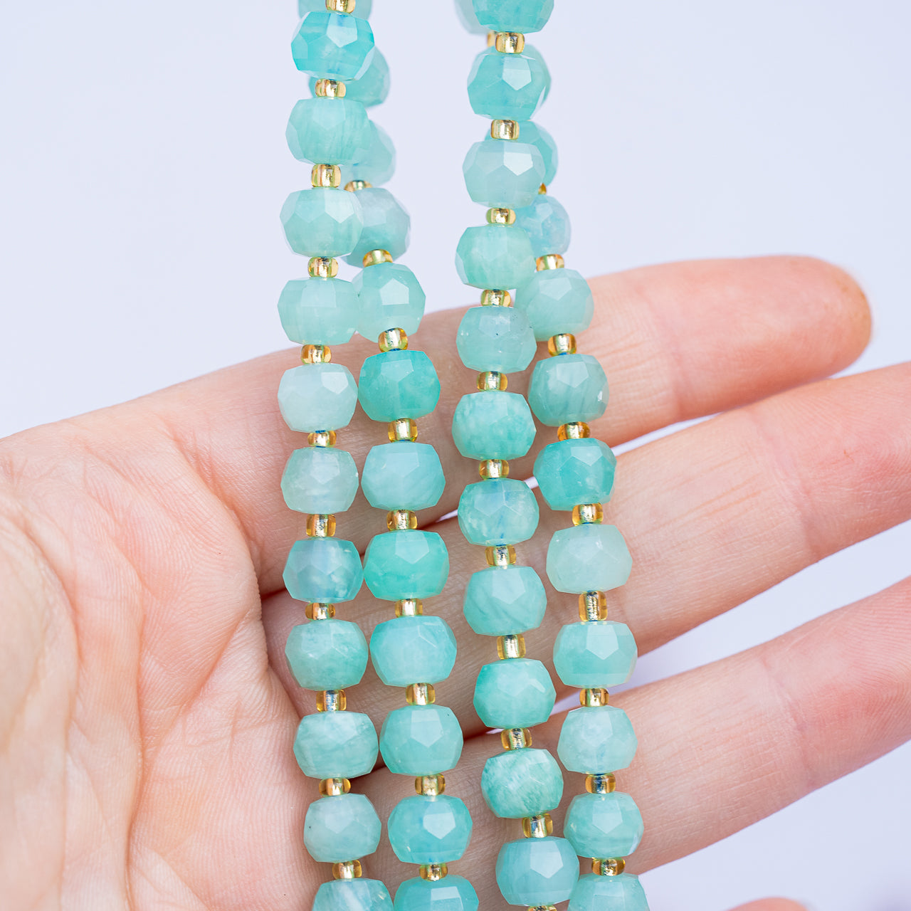 Perles rondelles facettes en Amazonite du Pérou de 7/8 mm ( 1/2 rang de env 23 perles )