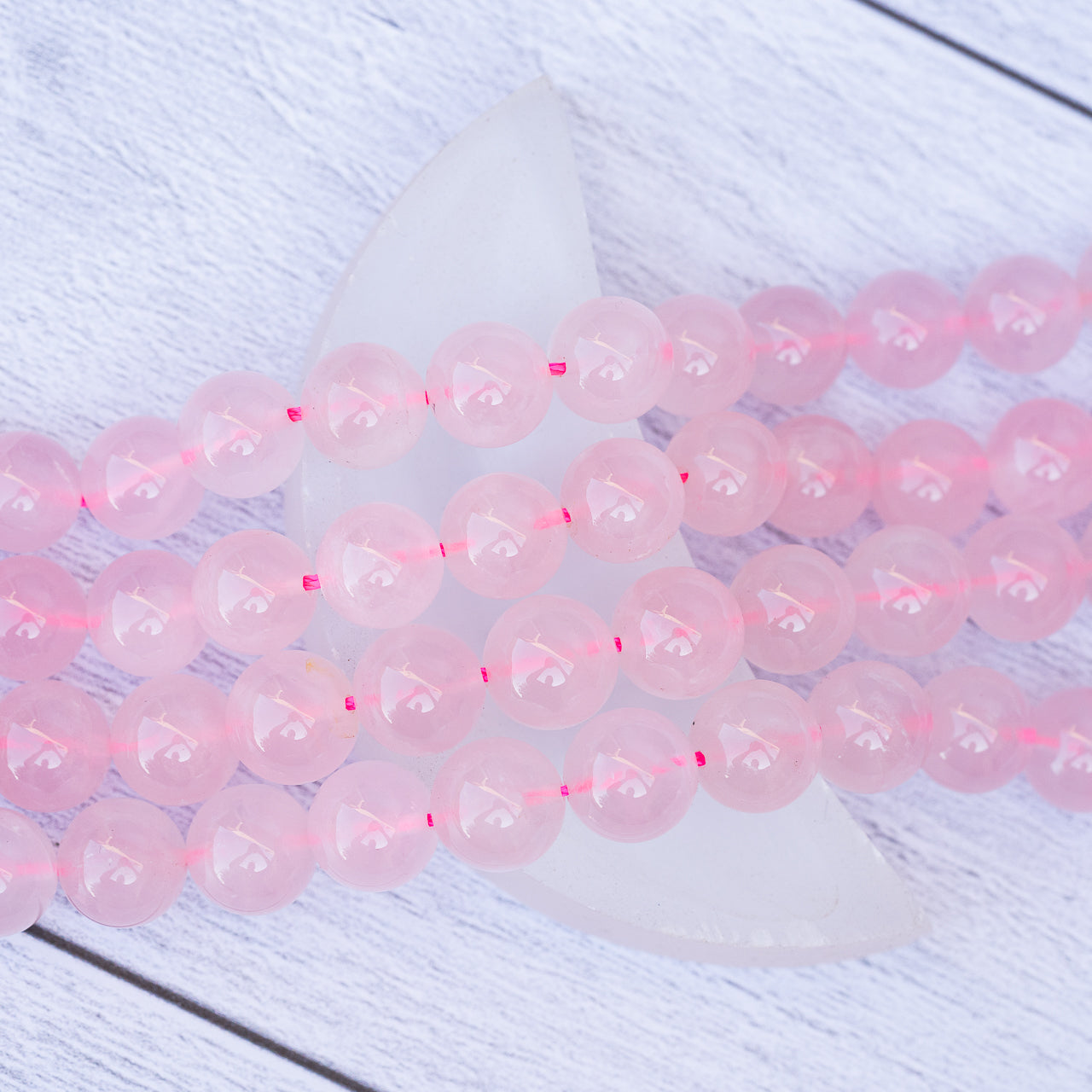 Perles rondes lisses de Quartz rose Madagascar de 10 mm ( 1/2 rang de env 20 perles )