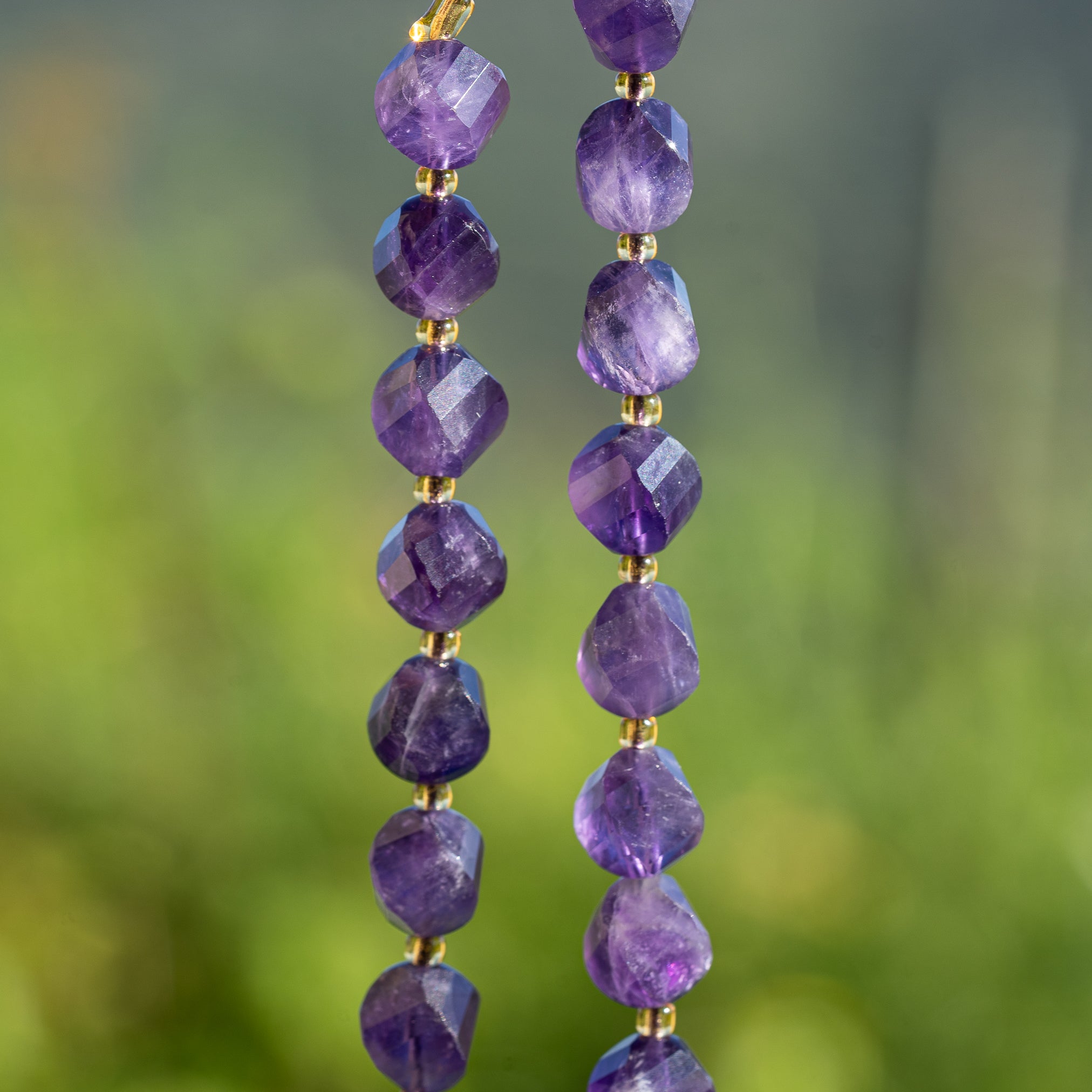 Perles rondes torsadées facettes en Améthyste de 10 mm ( lot de 2 perles )