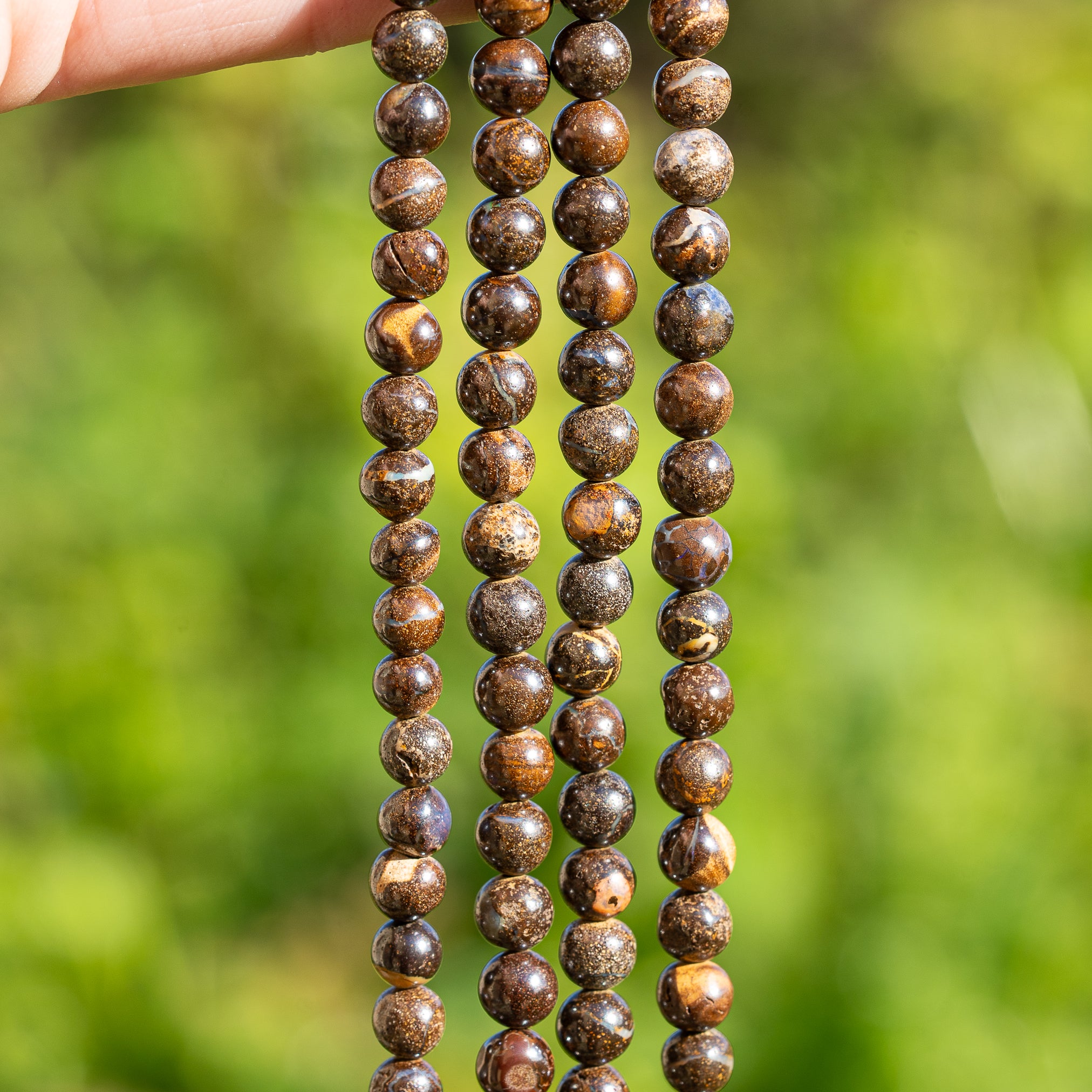 Perles rondes lisses en Opale boulder de 4,5/5,5 mm ( 1/2 rang de env 36 perles )