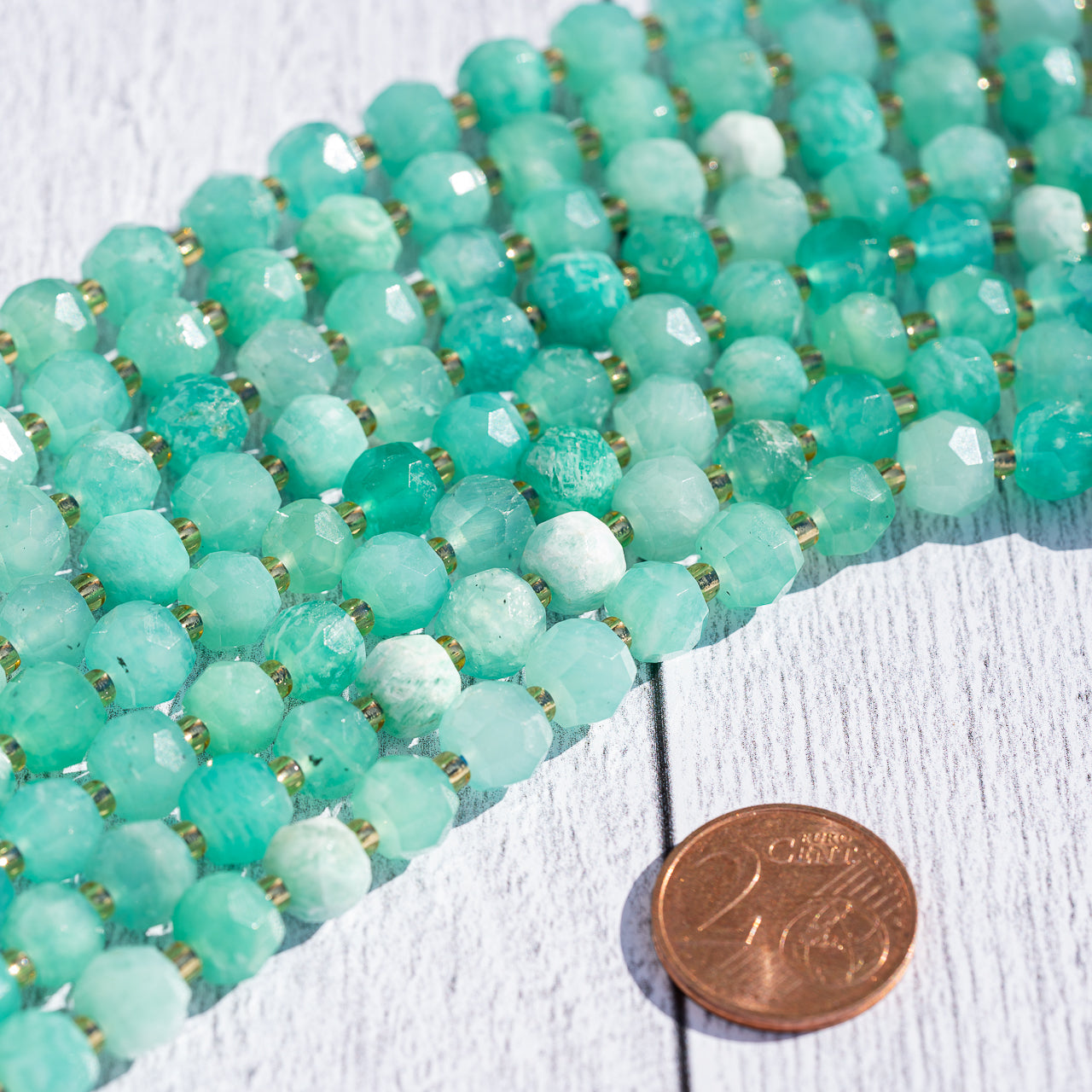 Perles rondelles facettes en Amazonite du Pérou de 7/8 mm ( 1/2 rang de env 23 perles )