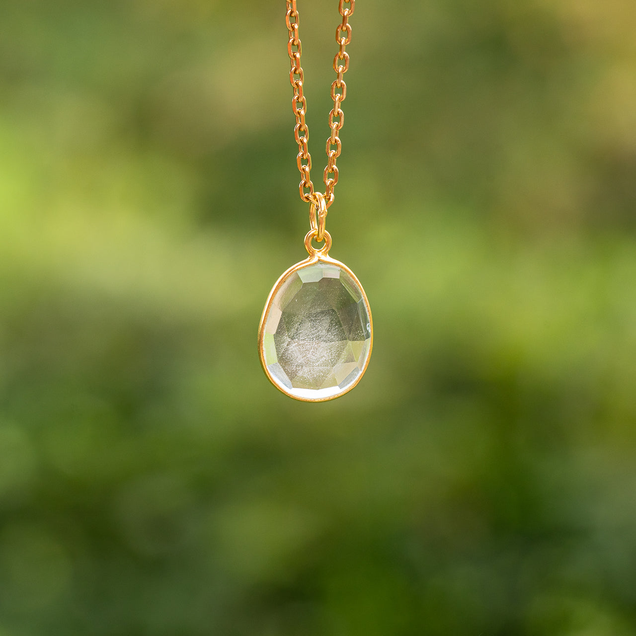 Les pendentifs " Nidhih " en Cristal de roche et argent 925 plaqué or