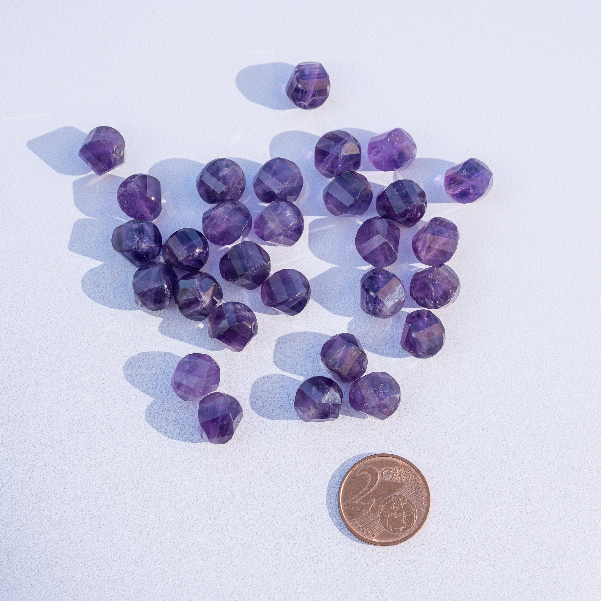 Perles rondes torsadées facettes en Améthyste de 10 mm ( lot de 2 perles )