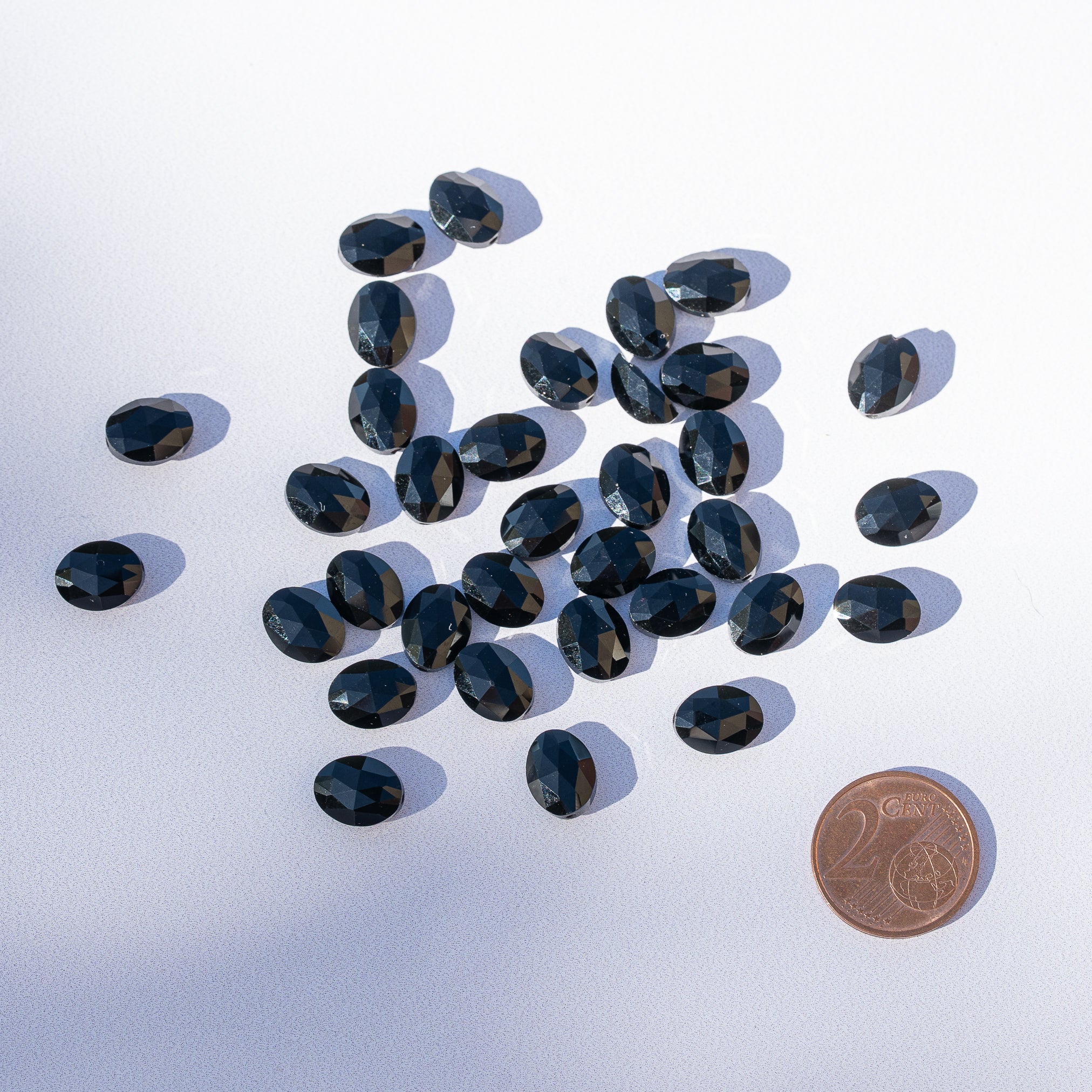 Perles ovales facettes en Obsidienne noire de 10 mm ( lot de 2 perles )