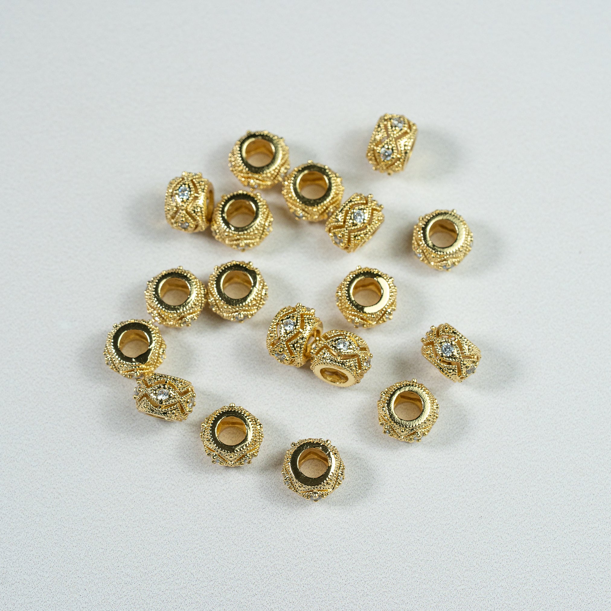 Perles rondelles en laiton plaqué or 18k et zirconium de 10 x 6,5 mm ( à l&