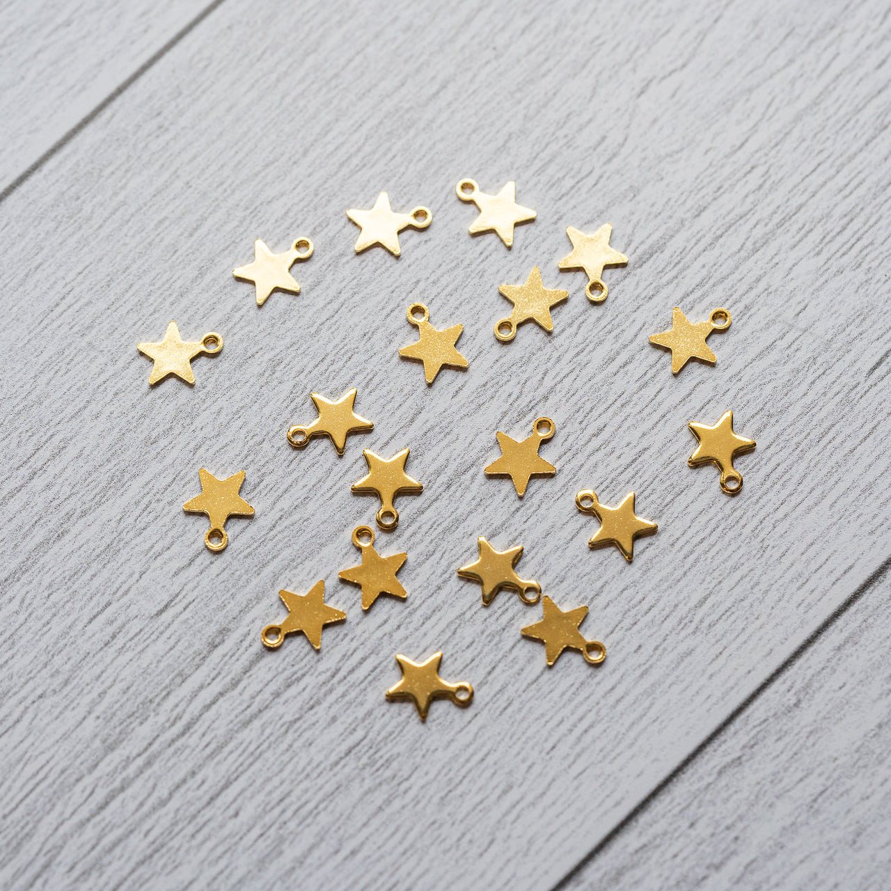 Petites breloques étoile en acier inoxydable plaqué or 18k de 10 mm ( à l&
