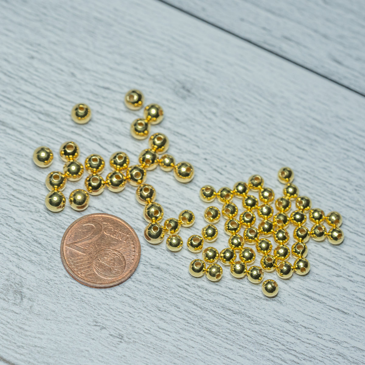 Perles rondes lisses laiton plaquées or 24K de 5 mm ( lot de 10 )