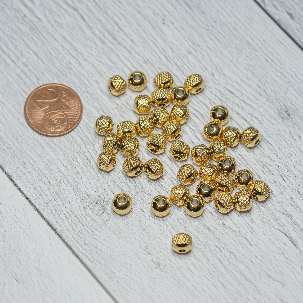 Perles rondelles striées en acier inoxydable plaqué or 18k de 6 x 5 mm ( lot de 4 )
