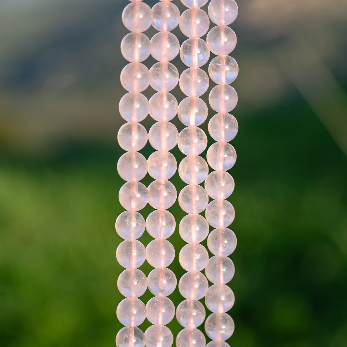Perles rondes lisses de Quartz rose clair de 8 mm ( rang de env 48 perles )